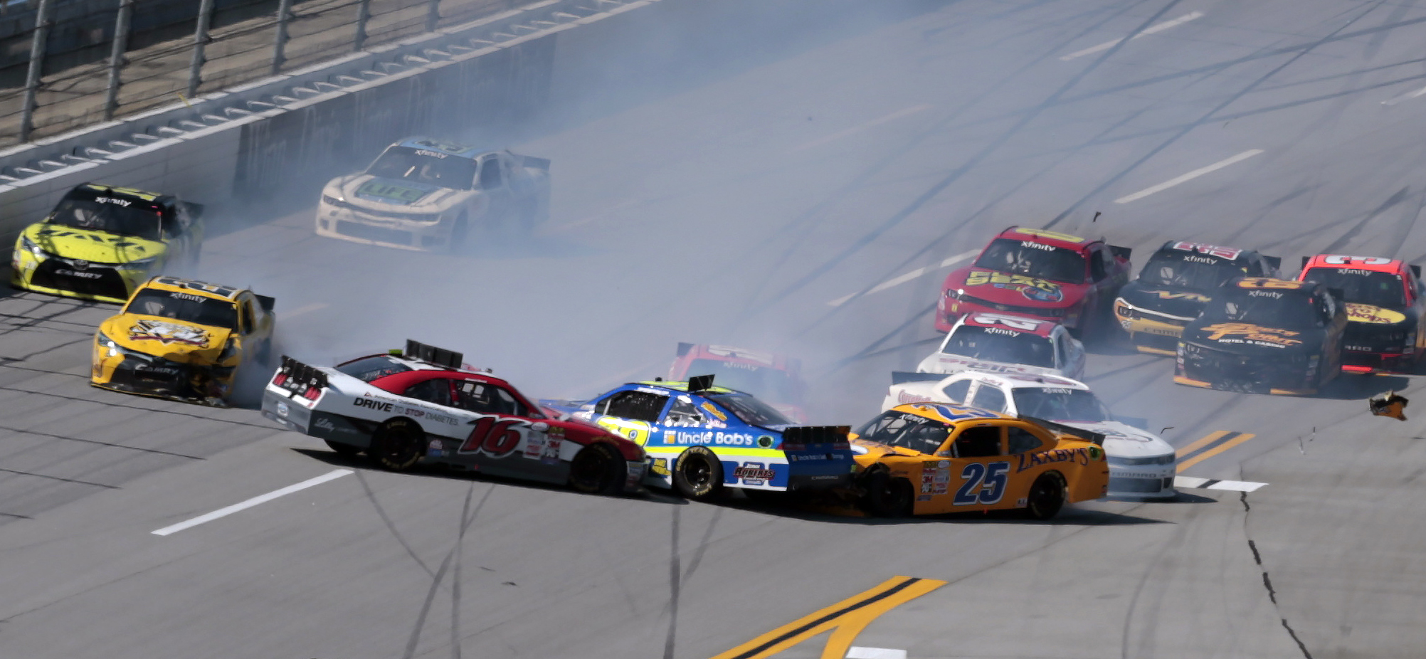 Joey Logano uses big block on last lap to win Xfinity race