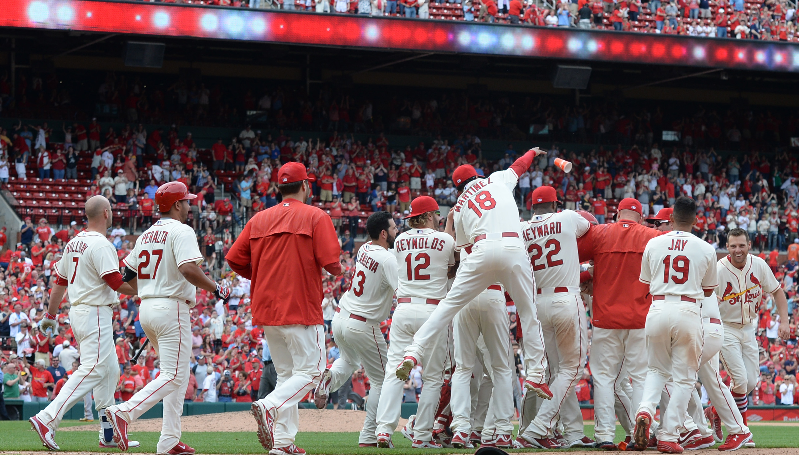 Cards again beat Pirates 2-1 in extras, win in 11th