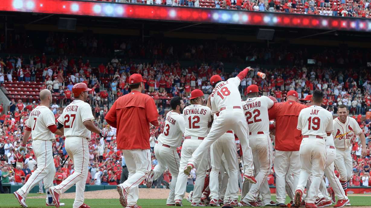 Cards again beat Pirates 2-1 in extras, win in 11th
