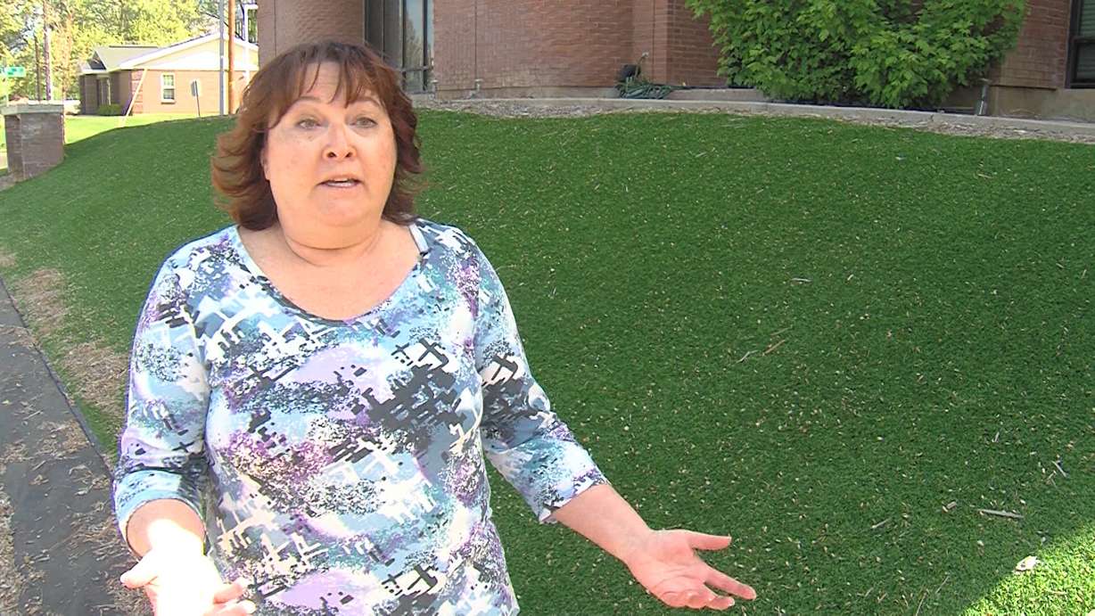 Administrators at the Family Support Center of Ogden, 3340 Harrison Blvd., are in a battle with city leaders over the artificial grass the nonprofit organization installed on its grounds last year. Executive director Pamela Clark says the move saved the organization big money, but she'll have to change city code to keep the fake lawn. (Photo: Mike Anderson, KSL-TV)