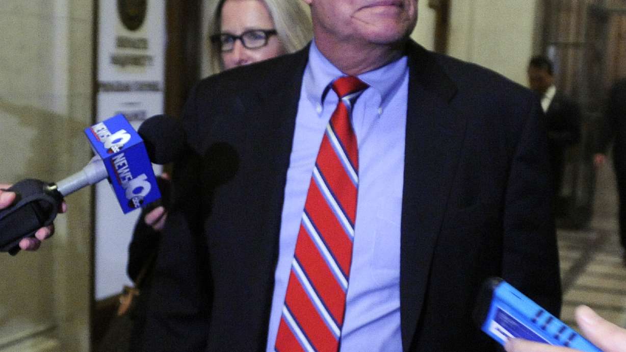 Top NY lawmaker clings to power after corruption charges