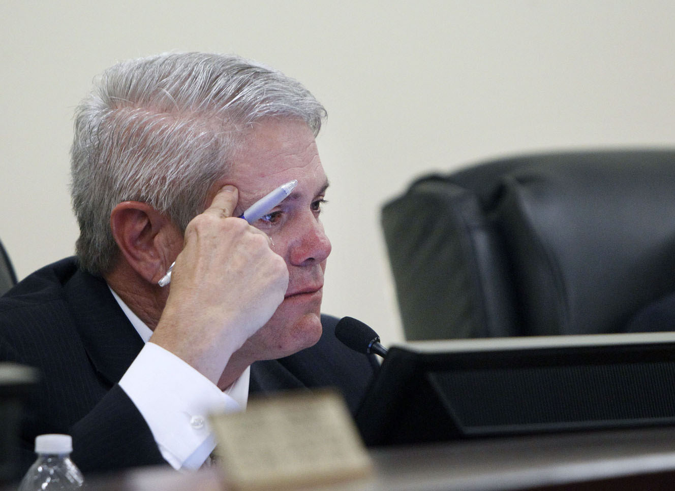 North Salt Lake Mayor Len Arave begins to cry as he responds to Ty Weston's remarks on the role of government to protect a resident's life, liberty and property during a meeting to discuss a funding plan to remediate the landslide in North Salt Lake on Tuesday, May 5, 2015. Photo: Chelsey Allder, Deseret News
