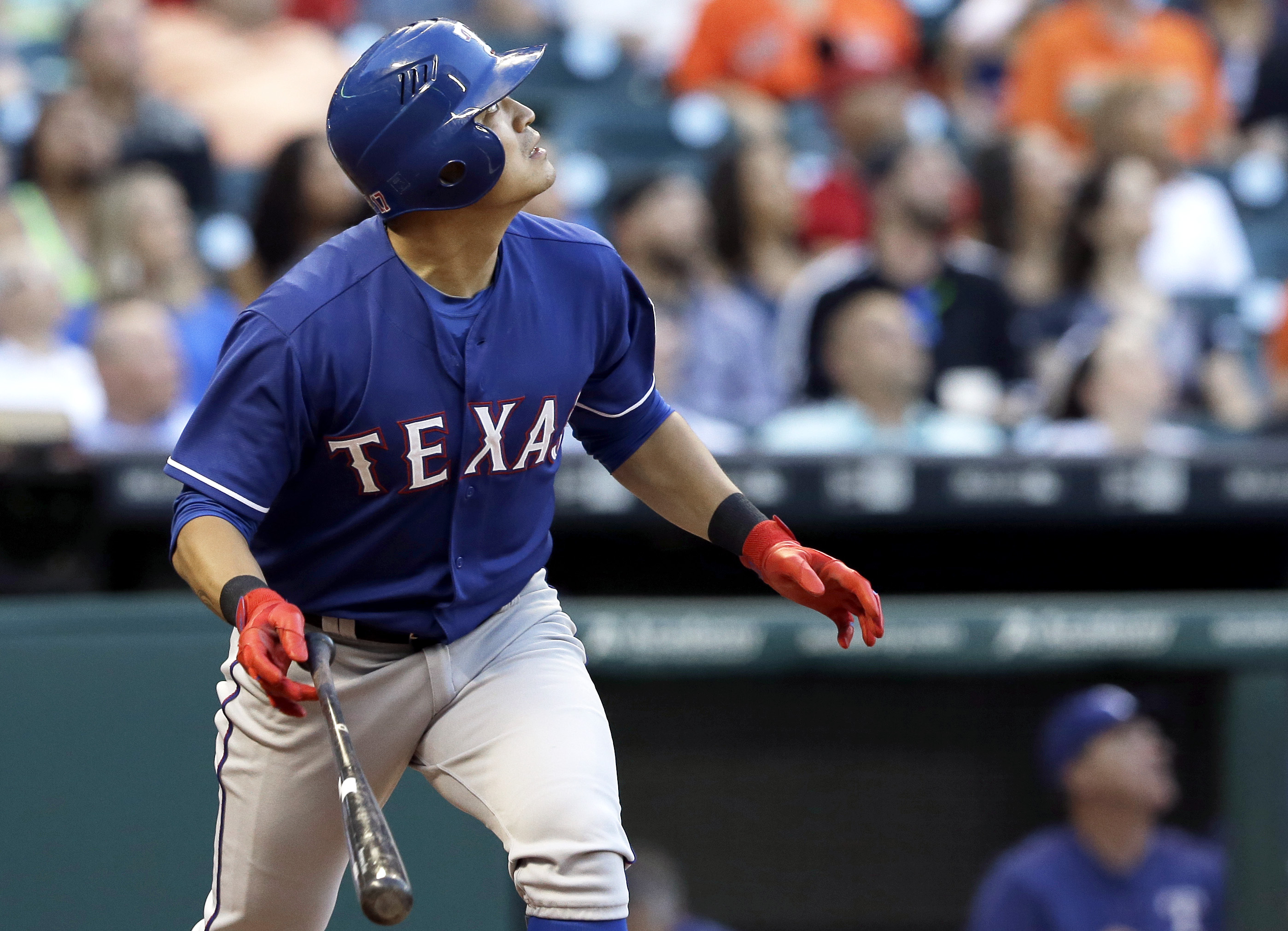 Peguero hits 2 homers, Rangers rout Astros 11-3 behind Lewis