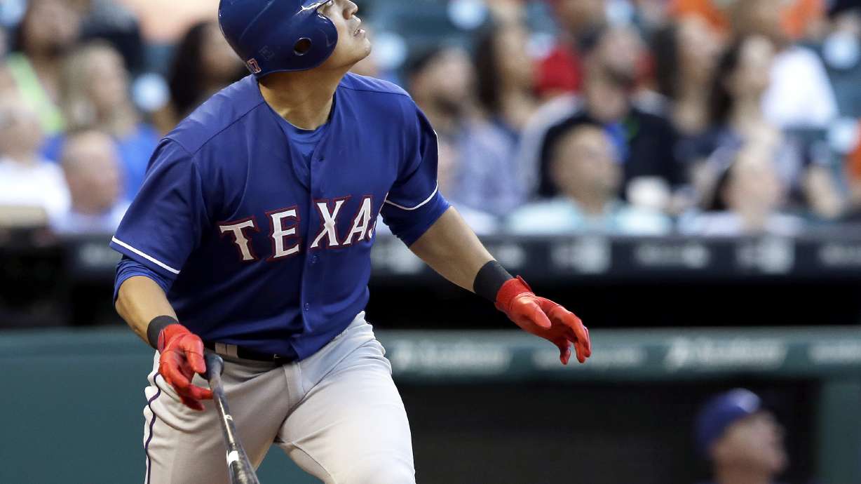 Peguero hits 2 homers, Rangers rout Astros 11-3 behind Lewis