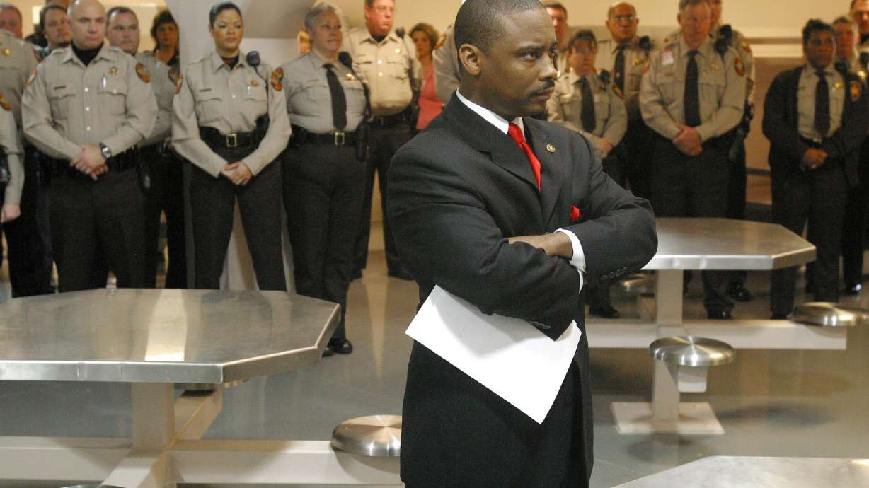 Lawman charged in shooting vows to continue as sheriff
