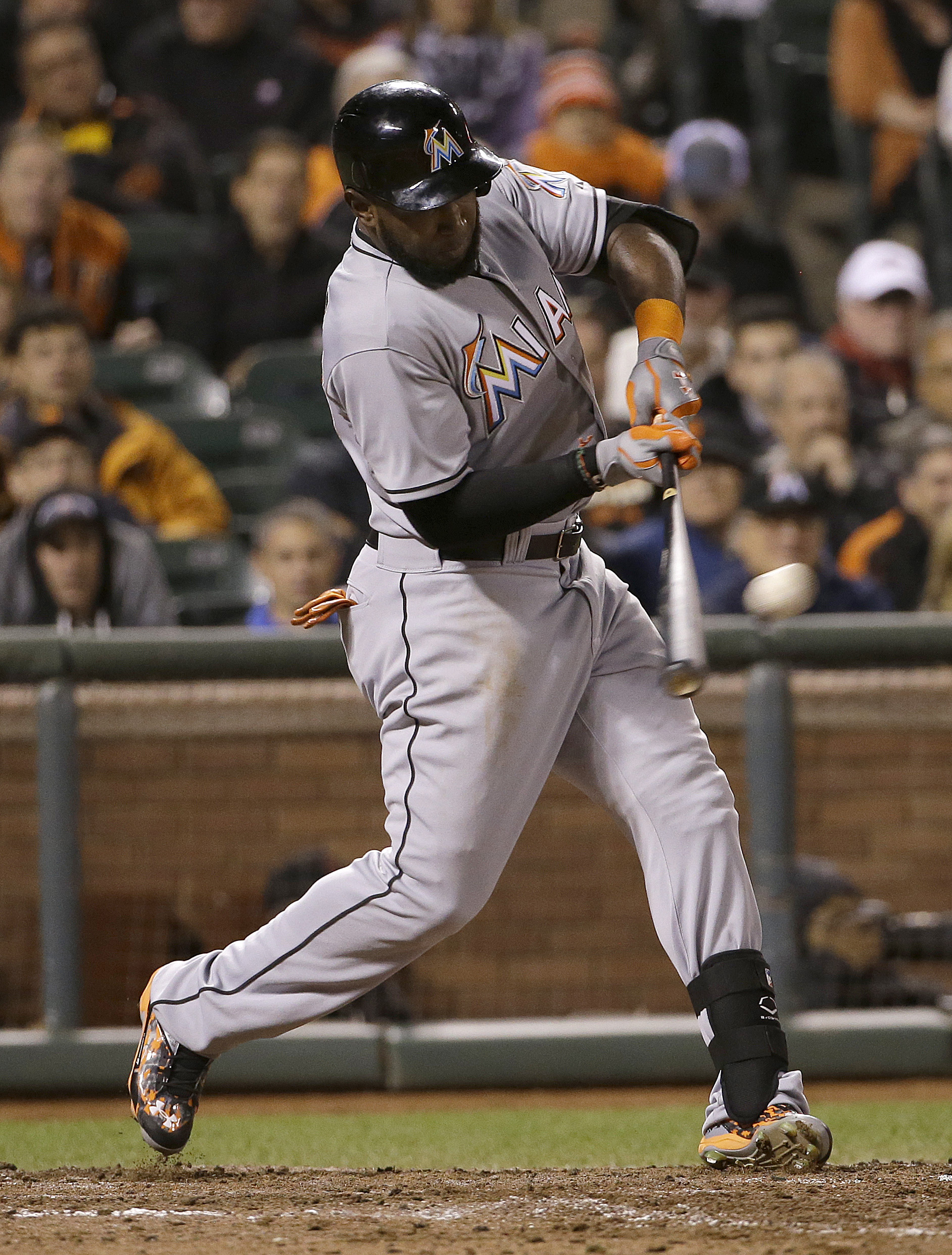 Haren uses bat, arm to lead Marlins past Giants 7-2