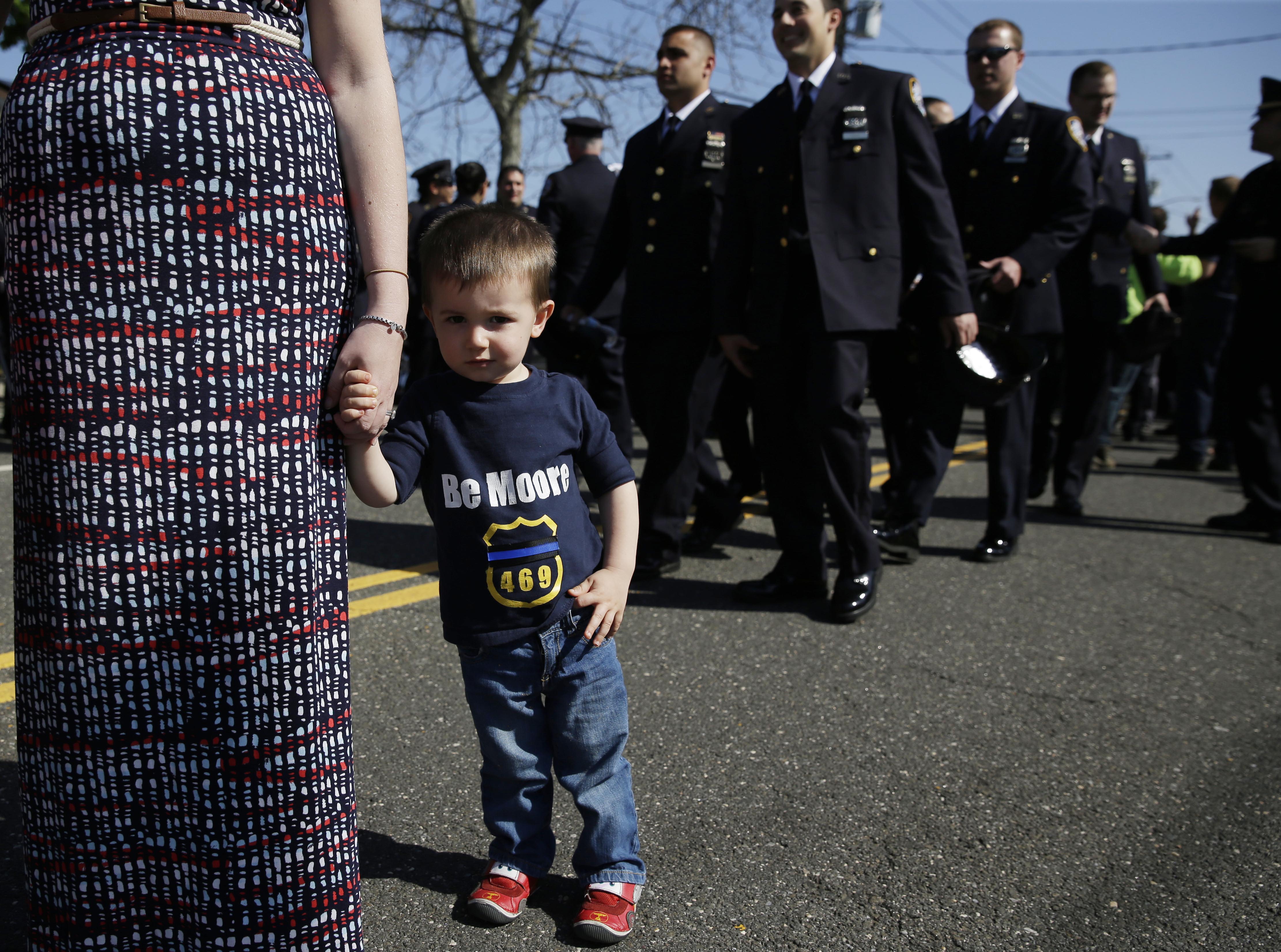 At New York officer's funeral, police reflect on tough time