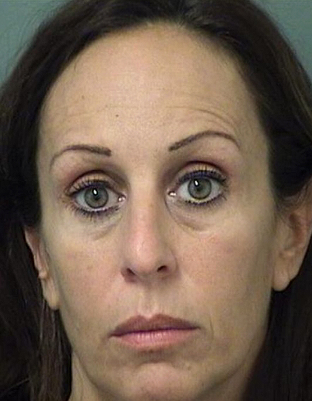 Principal arrested partially unclothed with student in car