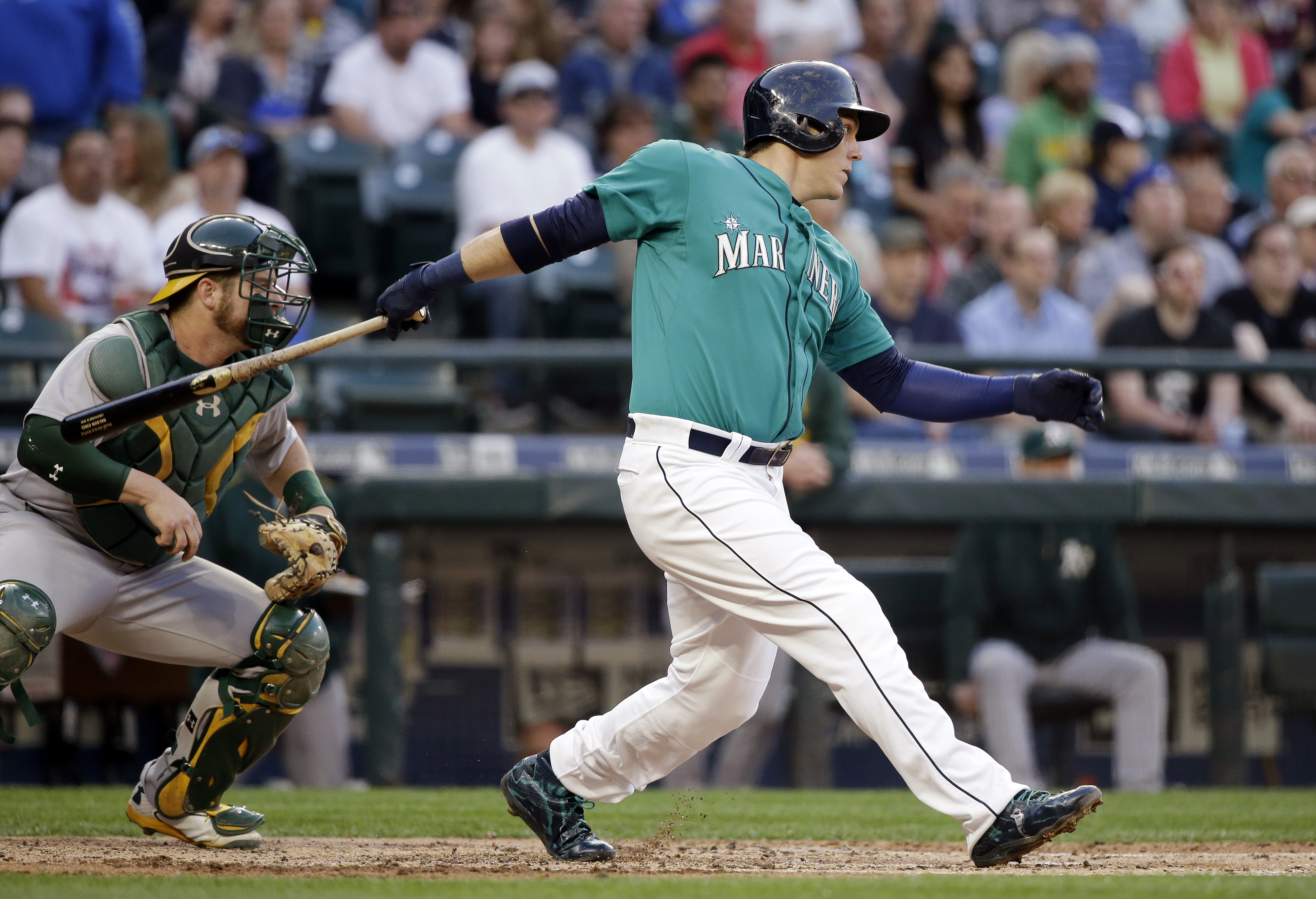 Morrison goes deep in 11th to give Seattle 4-3 win over A's