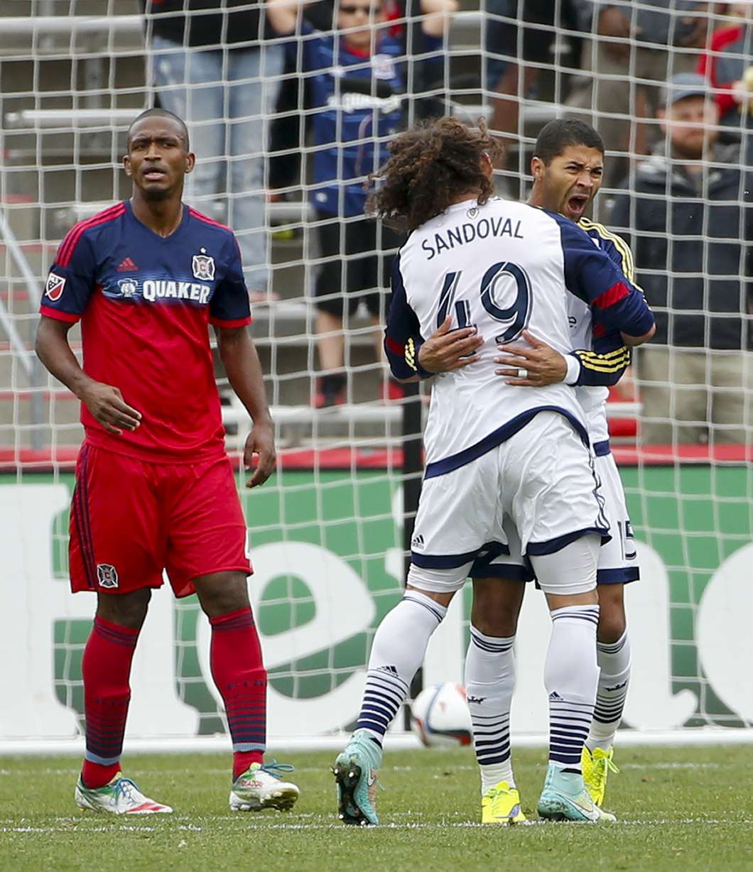Real Salt Lake forward Alvaro Saborio (15) celebrates with teammate Devon Sandoval (49) after scoring against the Chicago Fire during the first half of an MLS soccer game on Saturday, May 9, 2015, at Toyota Park in Bridgeview, Ill. (AP file photo)