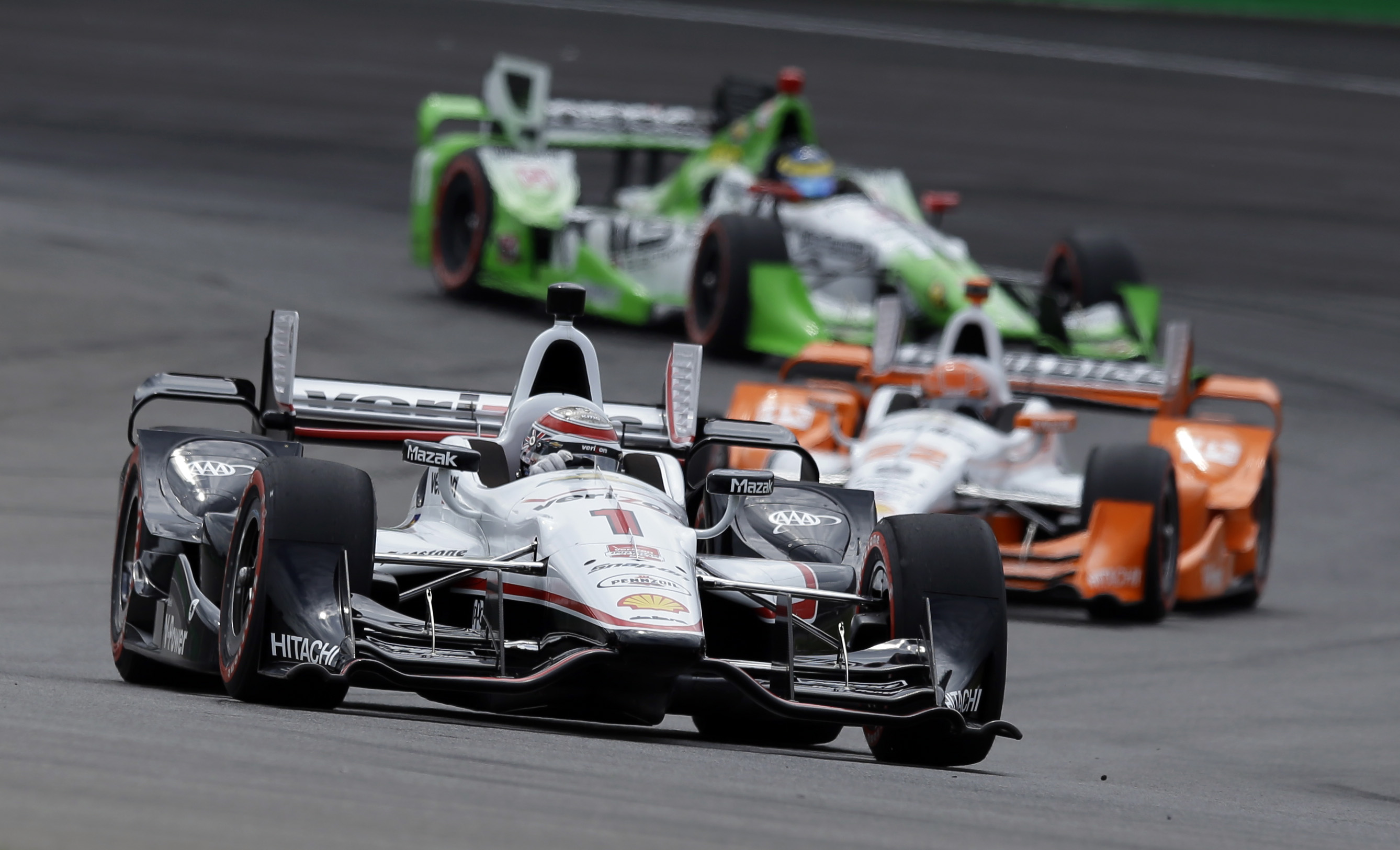 Power-packed race gives Penske 1st Grand Prix win at Indy