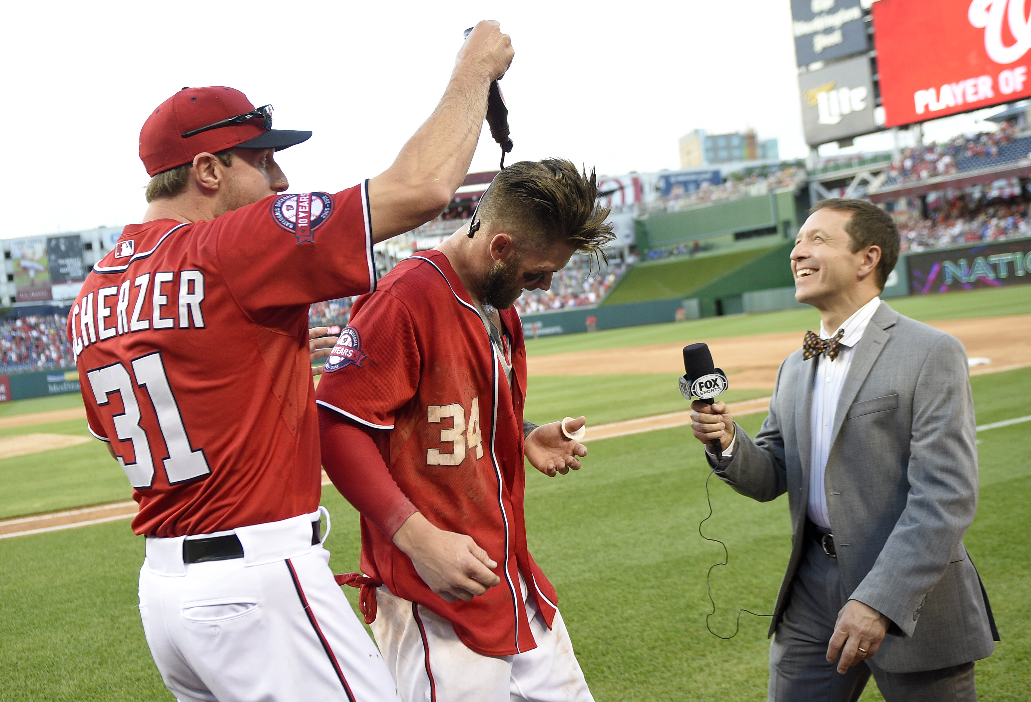 Harper's HR gives Nationals 8-6 win over Braves
