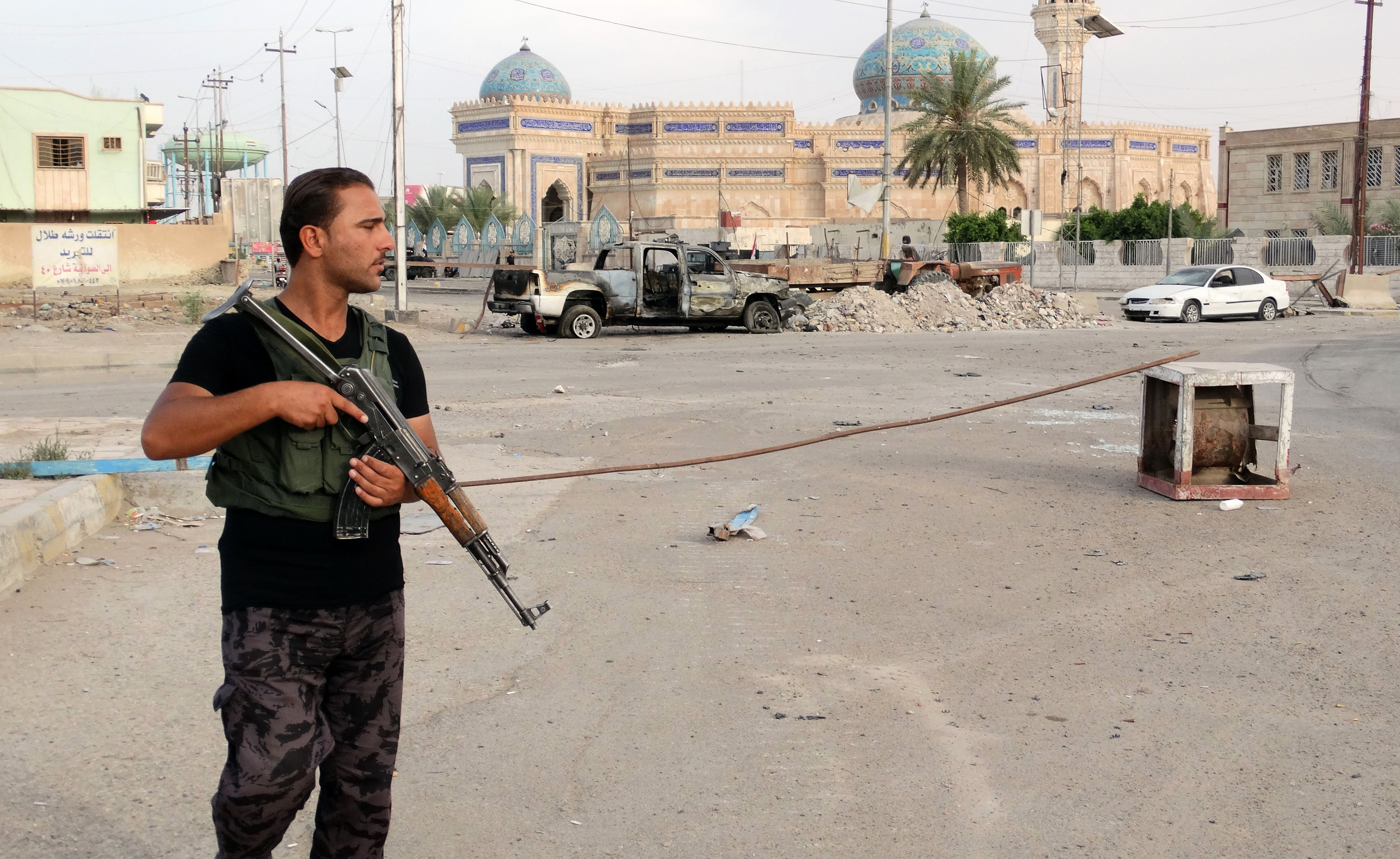 Bombings kill at least 14 in, outside Baghdad