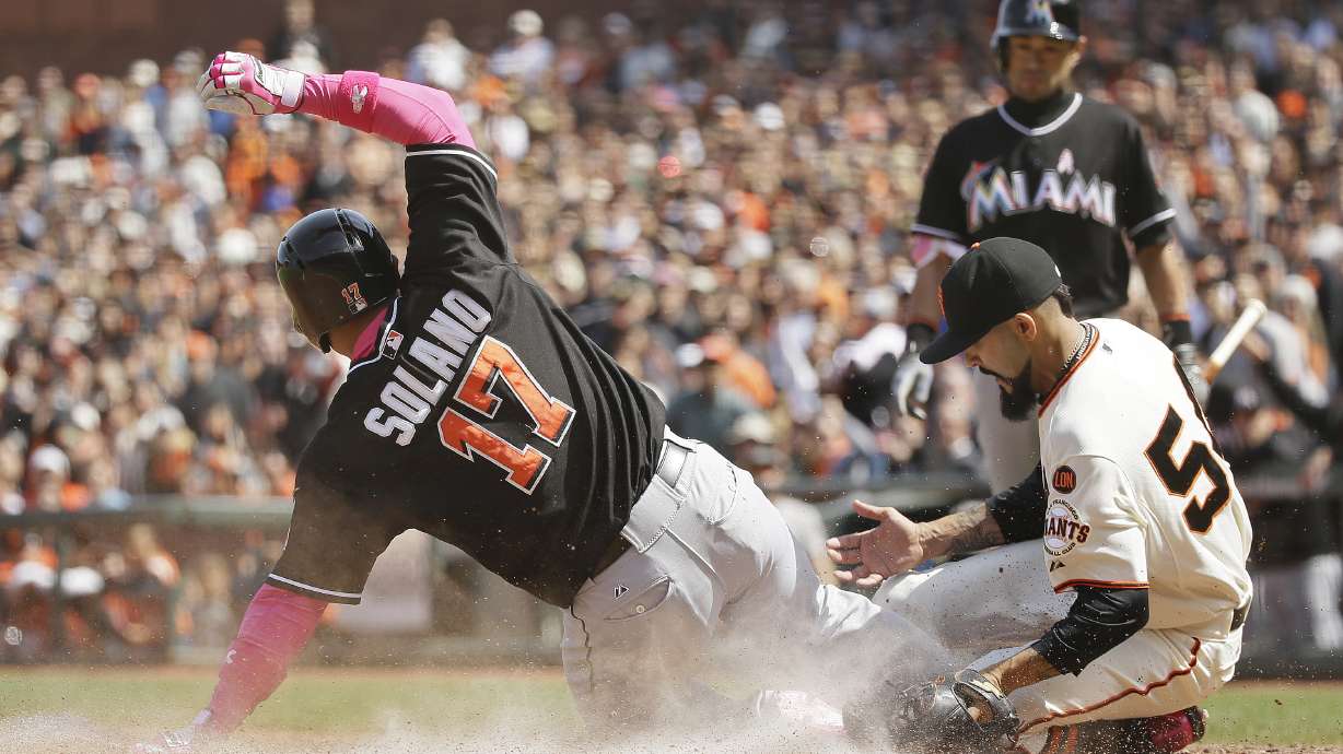Giants get 2 in the 9th to edge Marlins 3-2