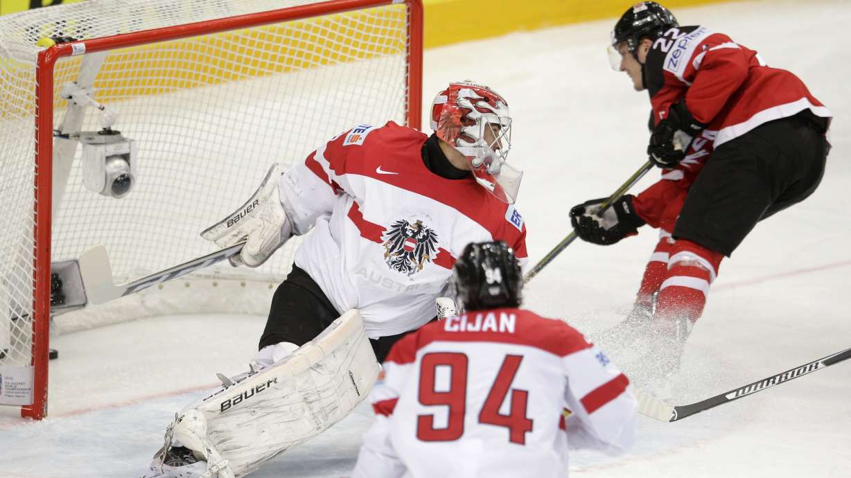 Belarus grabs last spot in quarters; US, Canada, Finland win