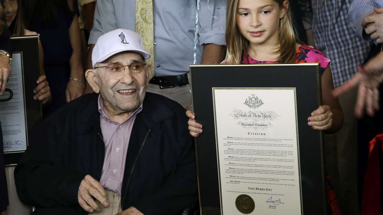 Berra celebrates 90th with return of rings, trophies