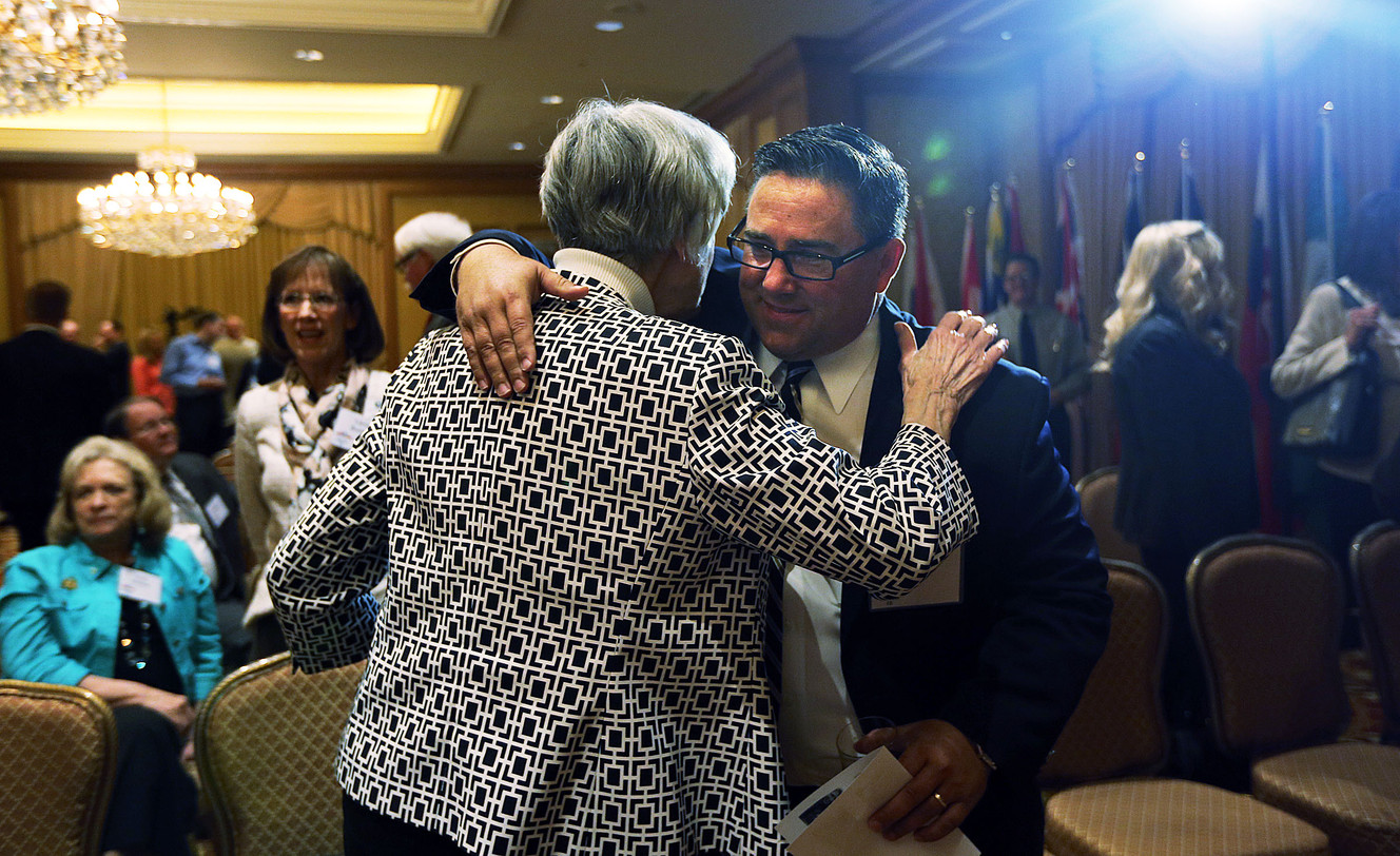 Pamela Atkinson and the Rev. Greg Johnson greet each other following a press conference in Salt Lake City, Tuesday, May 12, 2015, announcing that the World Congress of Families will meet in Salt Lake City in October. (Photo: Ravell Call, Deseret News)