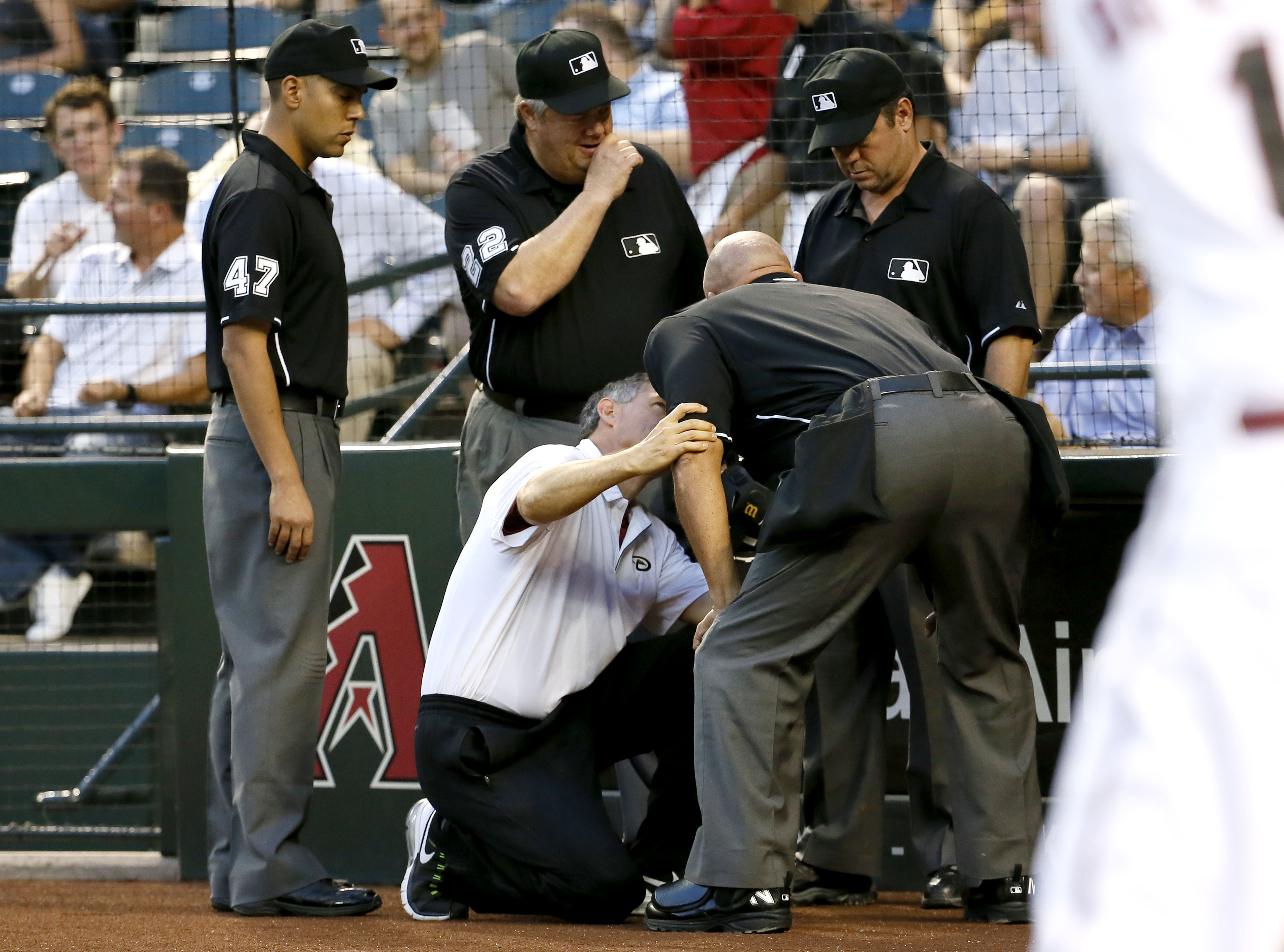 Plate umpire Danley leaves game after foul off his facemask