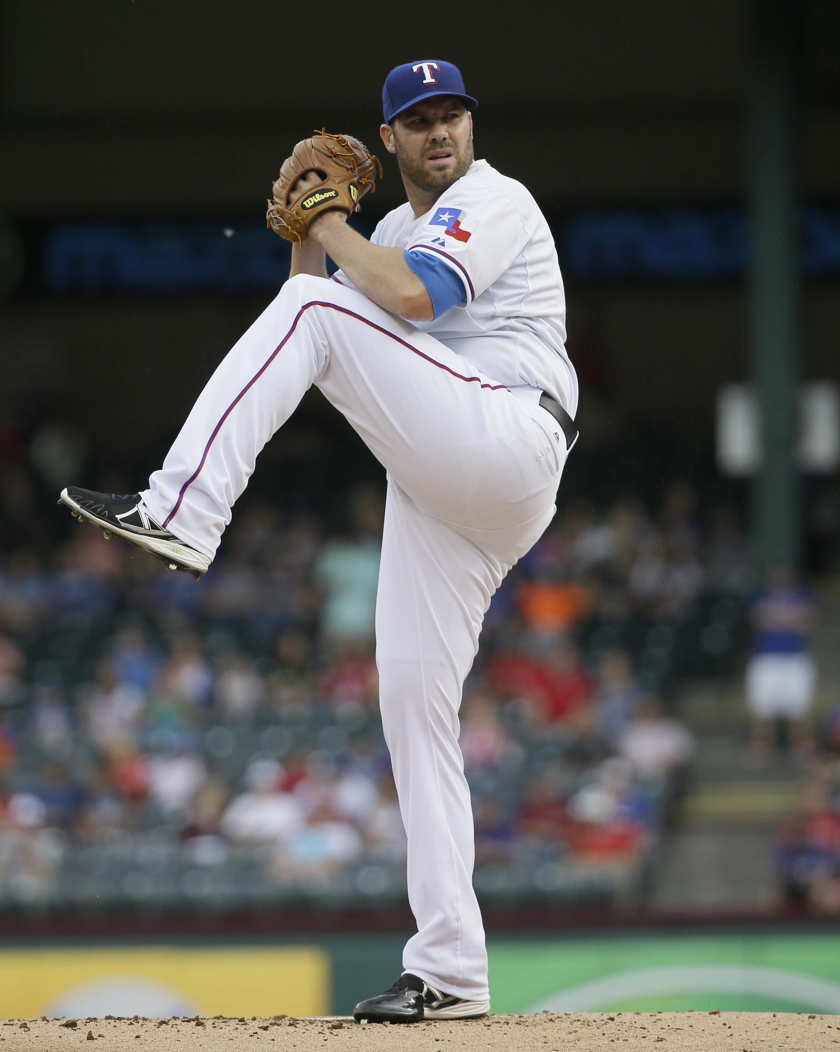 Fixed-up Colby Lewis pitching just fine for Texas Rangers