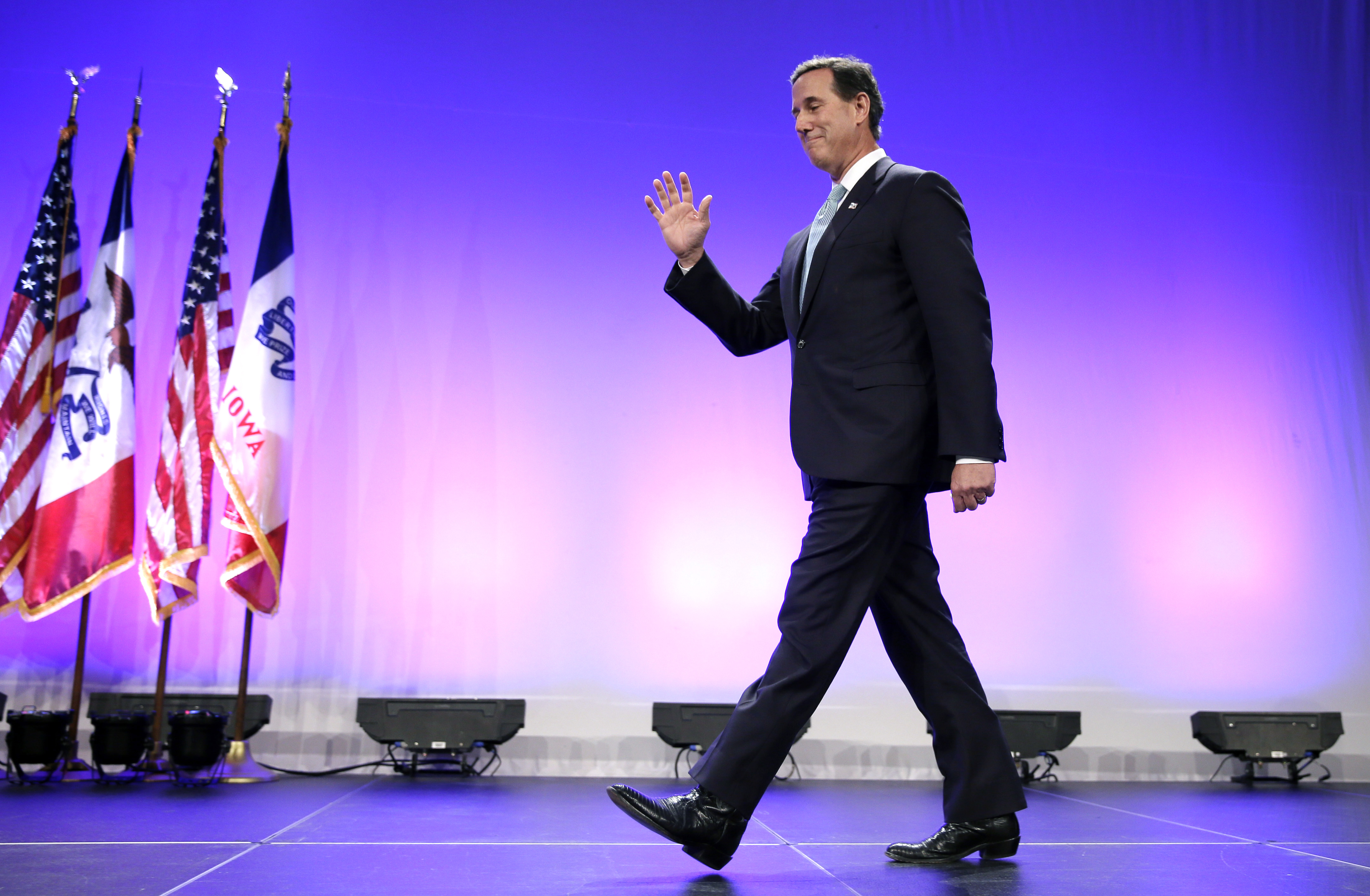 Santorum asks Iowa's Republican voters to look at his record