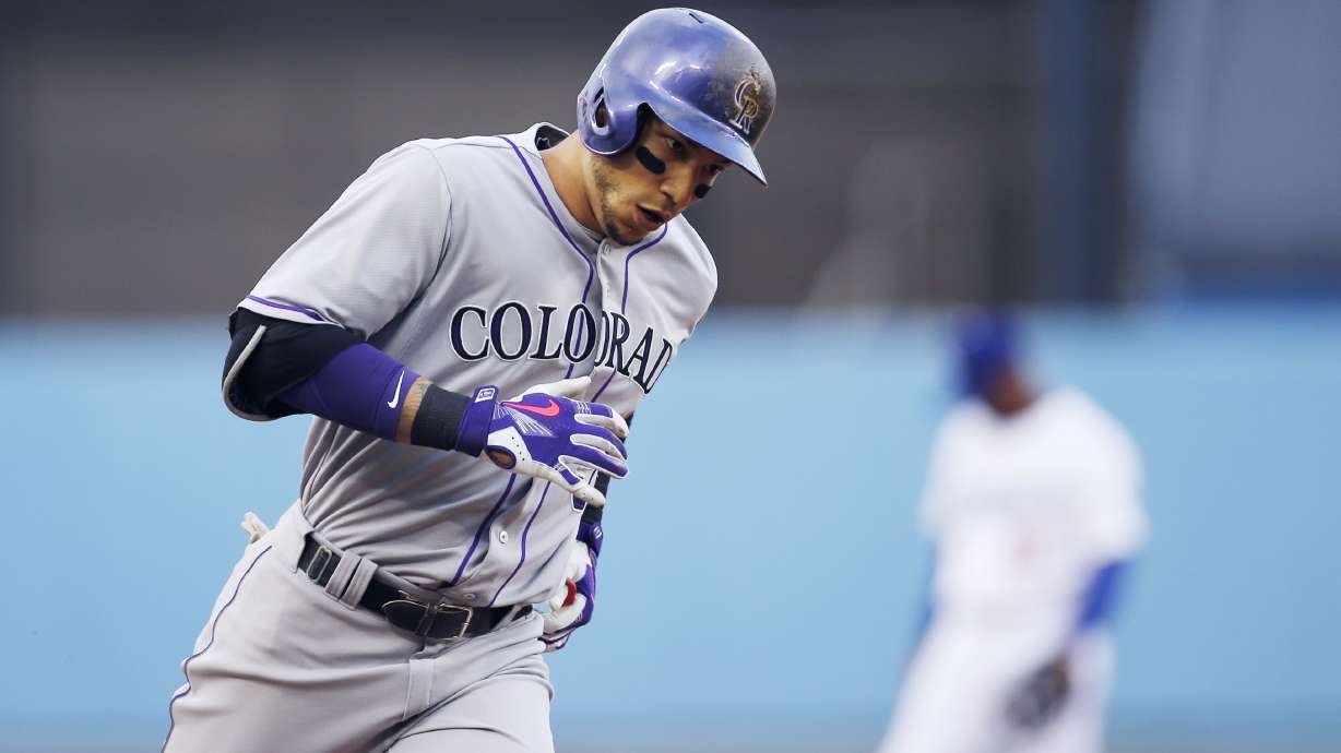 Rockies slug 3 HRs in De La Rosa's 7-1 win over Dodgers