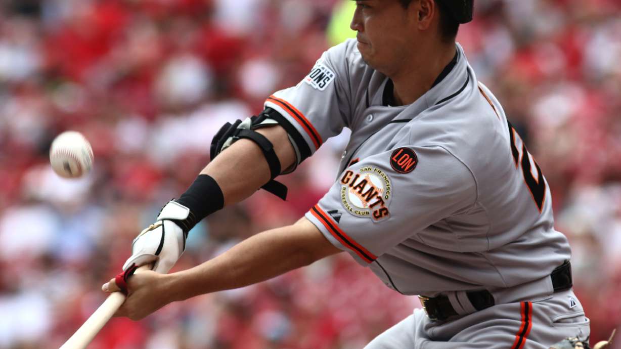 Belt's 3rd homer in 3 games helps Giants beat Reds 9-8