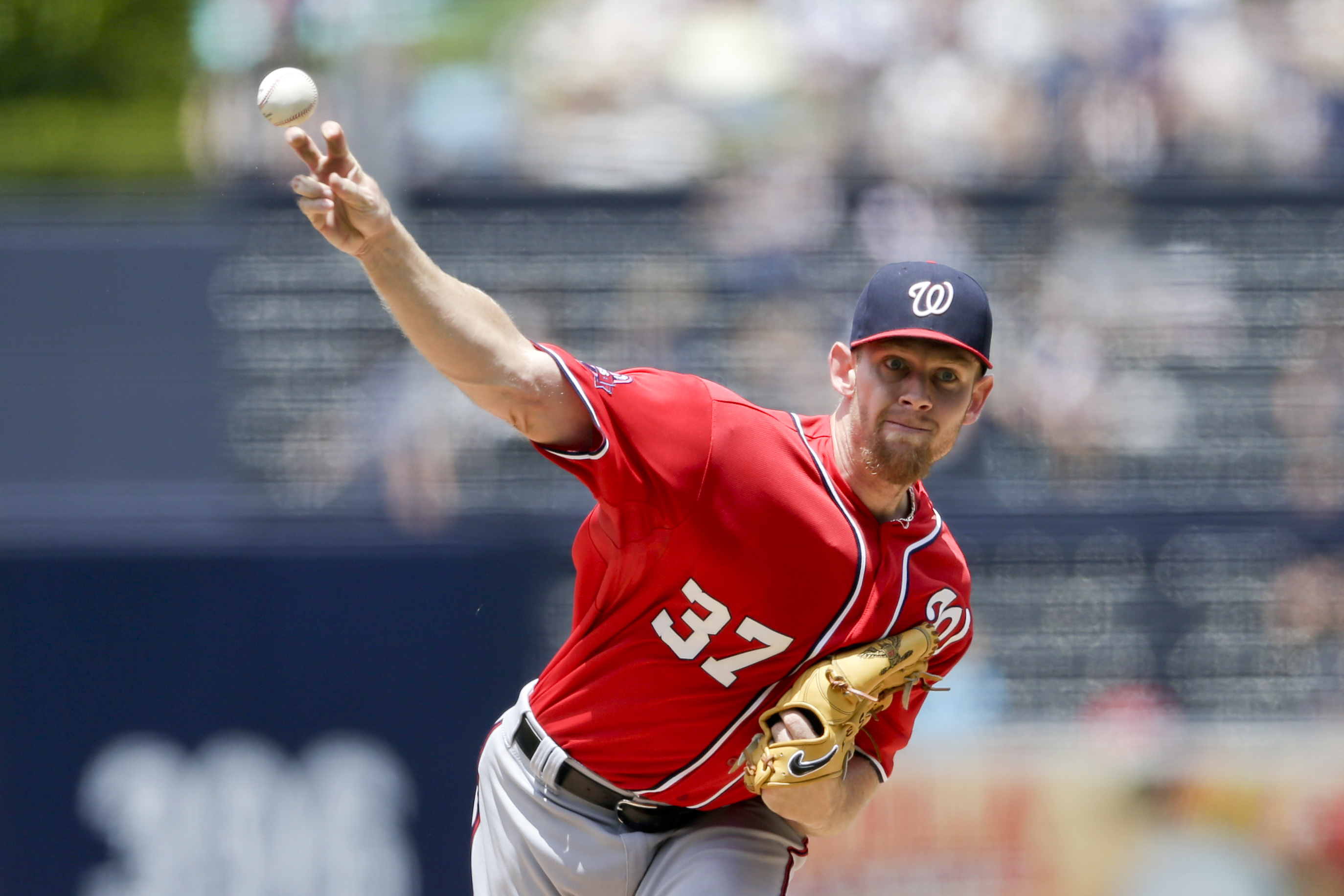 Strasburg beats Padres again, Harper homers in 10-5 win