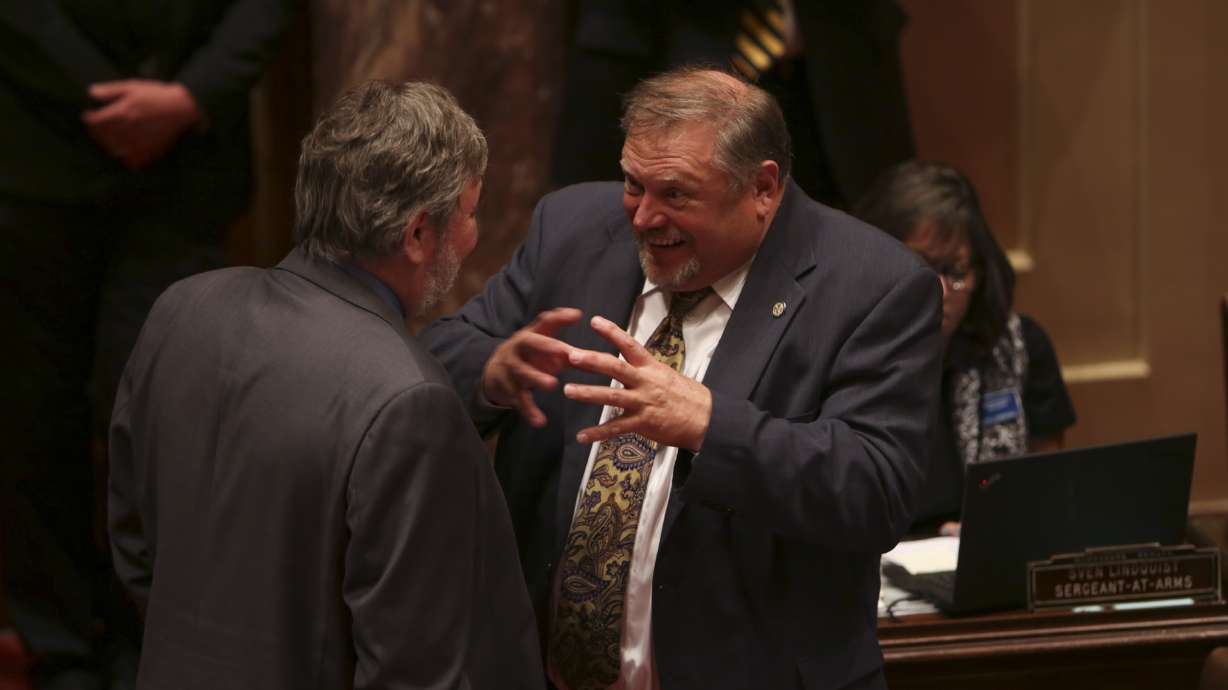 Dayton readies veto pen after lawmakers pass budget