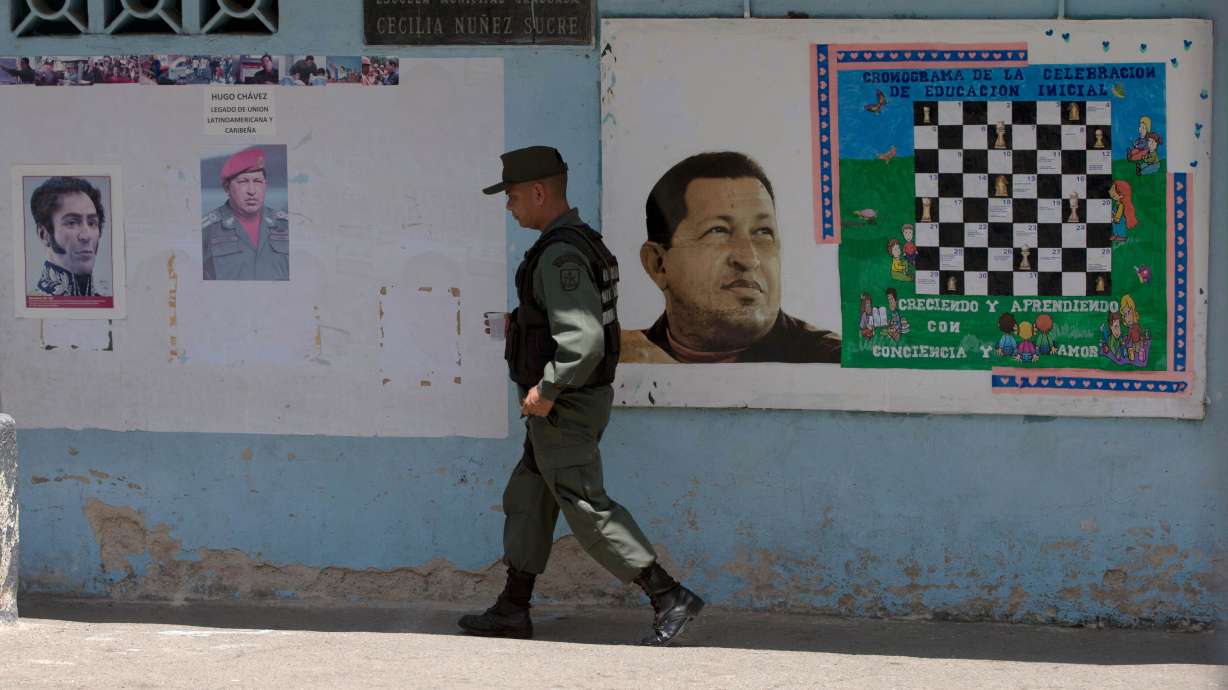 Behind bars, on the ballot; ex-mayor wins Venezuela primary