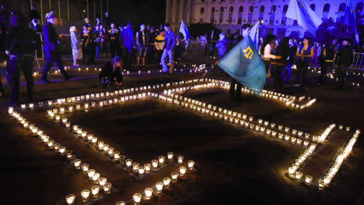 Crimean police detain Tatars commemorating mass deportation