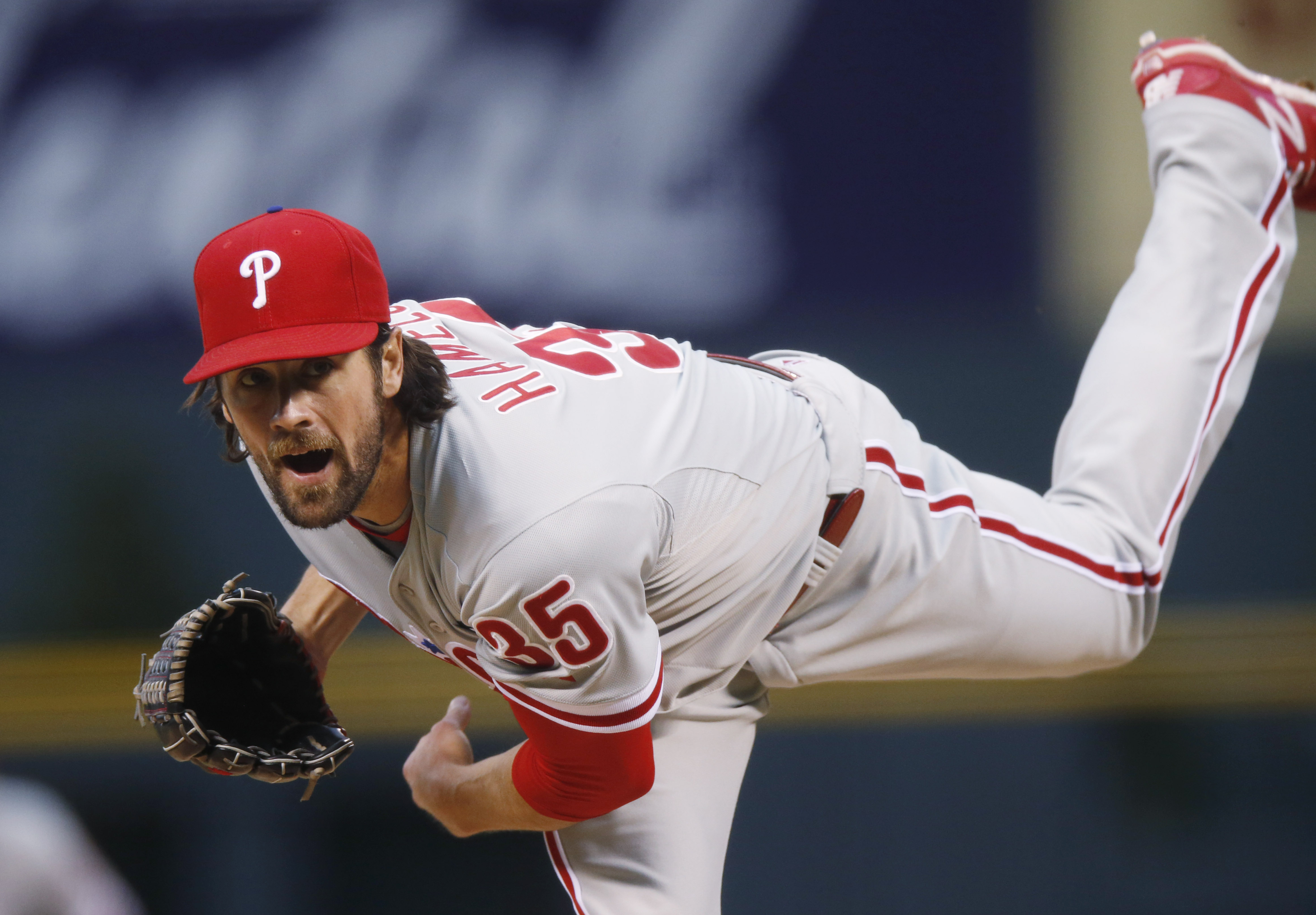 Hamels pitches Phillies past Rockies 4-3 for 6th straight