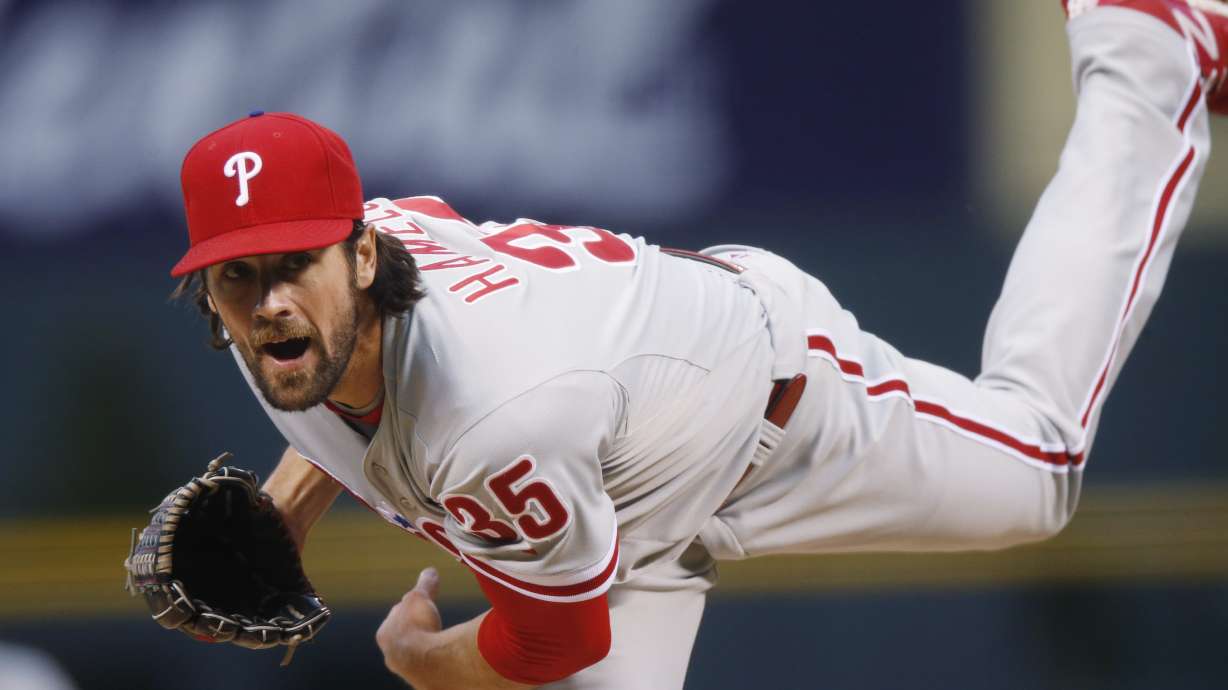 Hamels pitches Phillies past Rockies 4-3 for 6th straight
