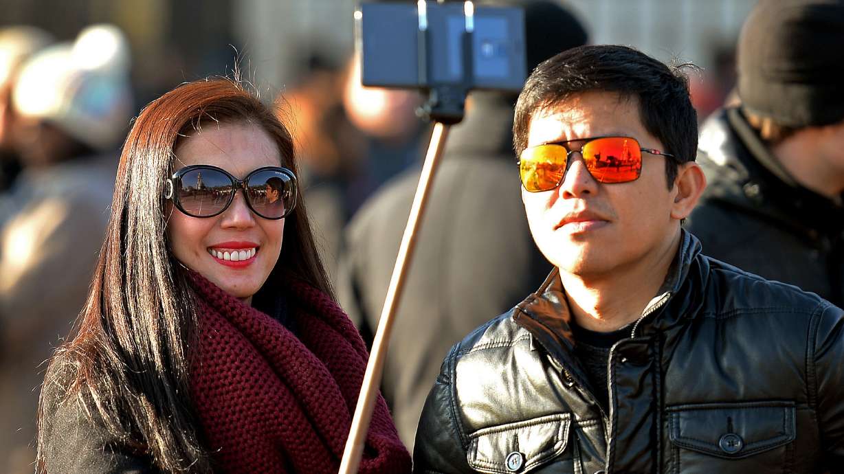 Disney World tells riders to stop using selfie sticks