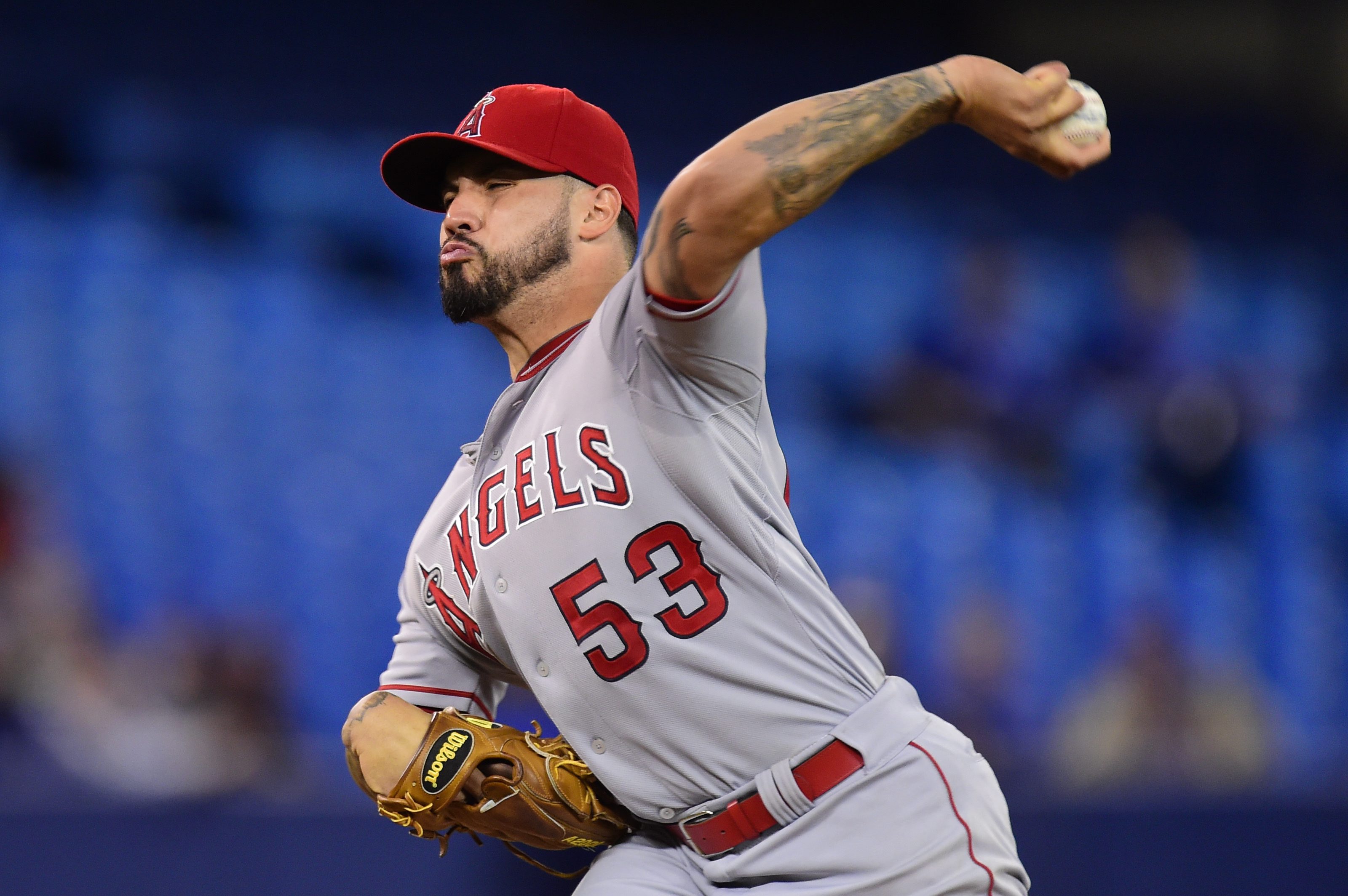 Santiago goes 7 innings for win, Angels beat Blue Jays 3-2