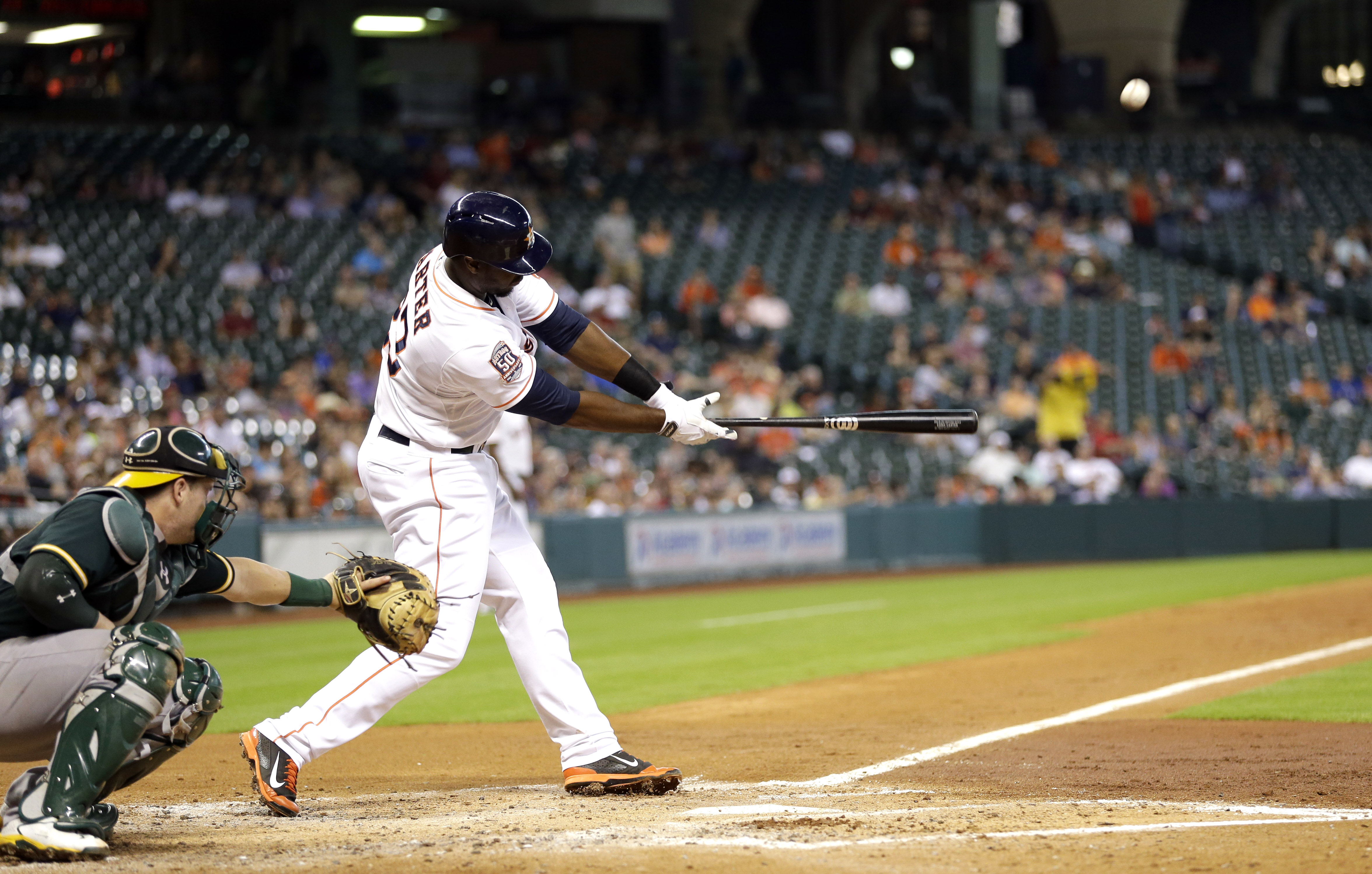 Carter, Rasmus homer to back Hernandez as Astros beat A's