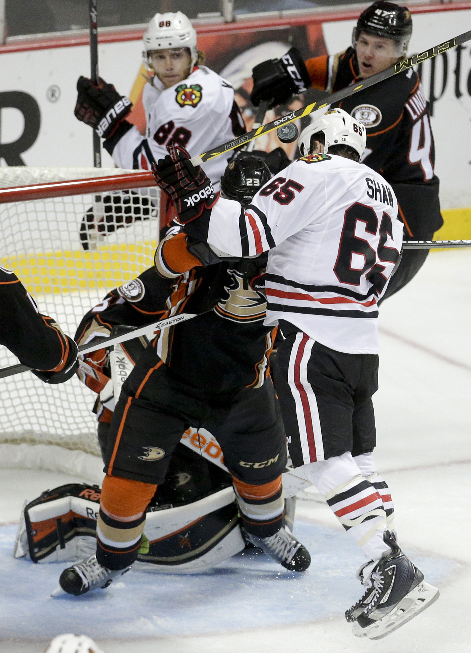 Chicago's Shaw heads puck into net for disallowed goal in OT