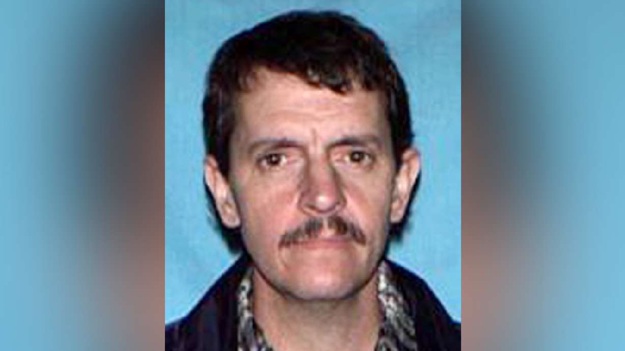 Police: Woman held in box for months found dead, man sought