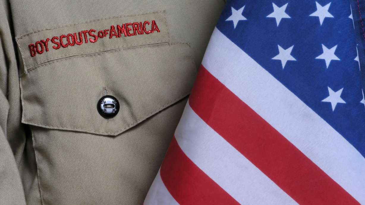 A Boy Scouts of America uniform is shown. BSA has reached an $850 million settlement with groups representing tens of thousands of men with sexual abuse claims.