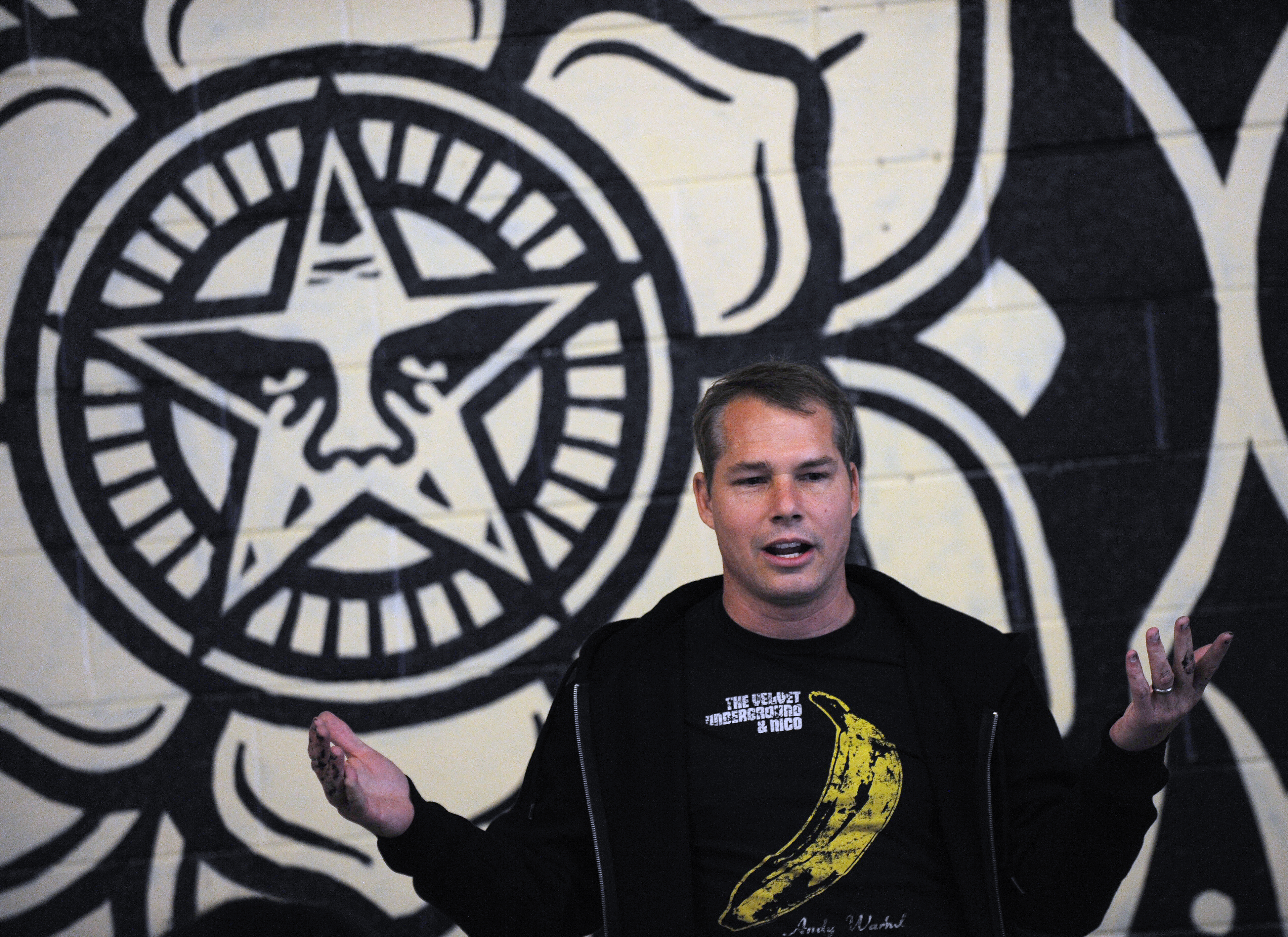 Street artist Shepard Fairey finishes large Detroit mural
