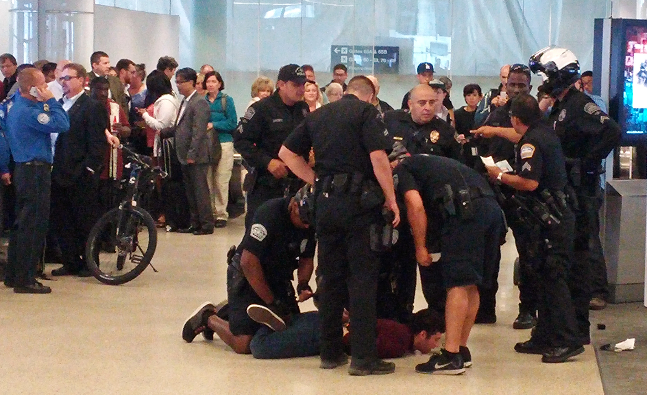 Man charged after pushing past Los Angeles airport security
