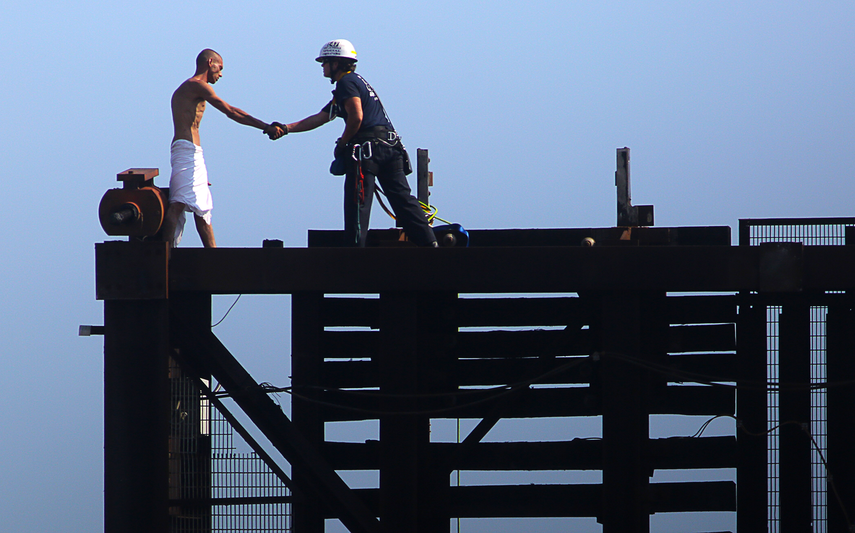 Naked man rescued after getting stuck on Florida drawbridge