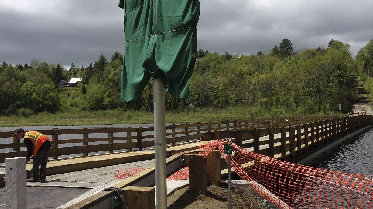 Vermont town's famous floating bridge reopens with fanfare