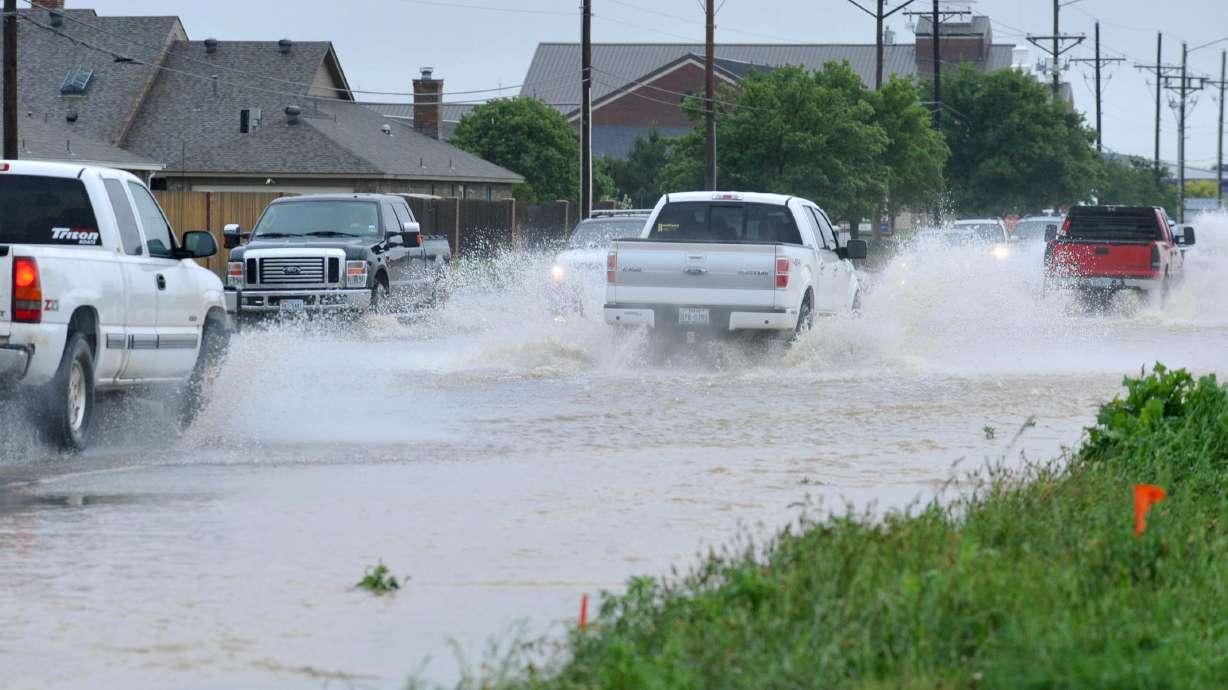 The Latest on flooding: Music festival evacuated in Oklahoma