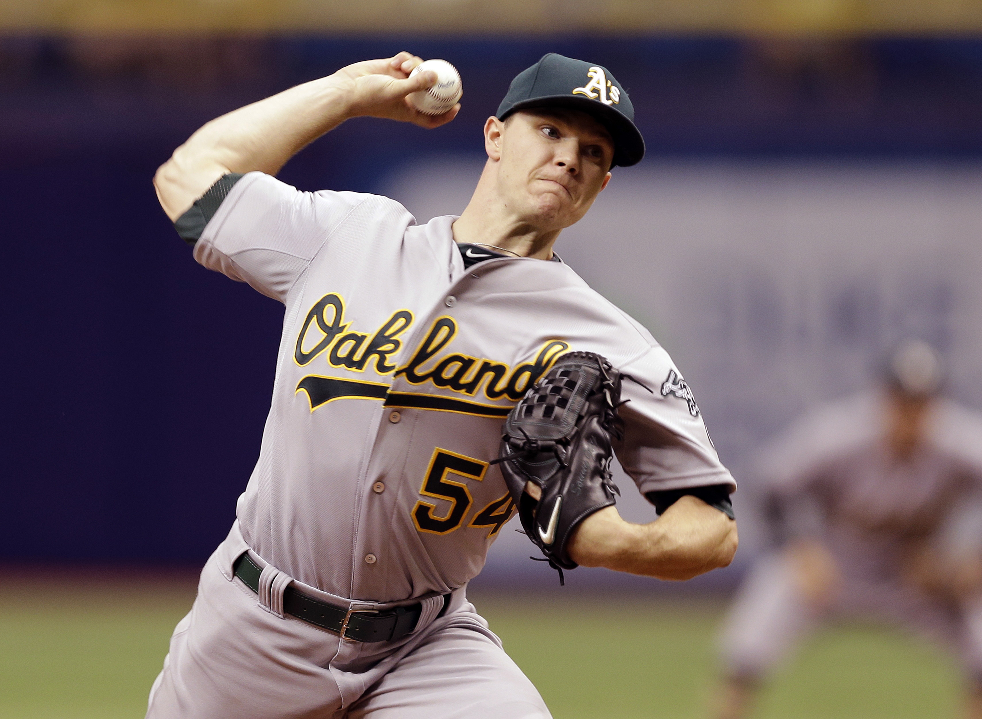 Gray hit by ball, leaves with bruised ankle as A's top Rays