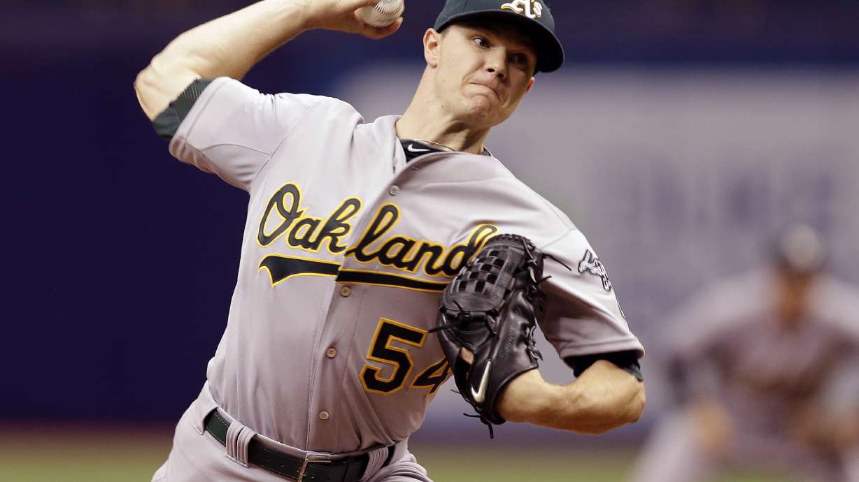 Gray hit by ball, leaves with bruised ankle as A's top Rays