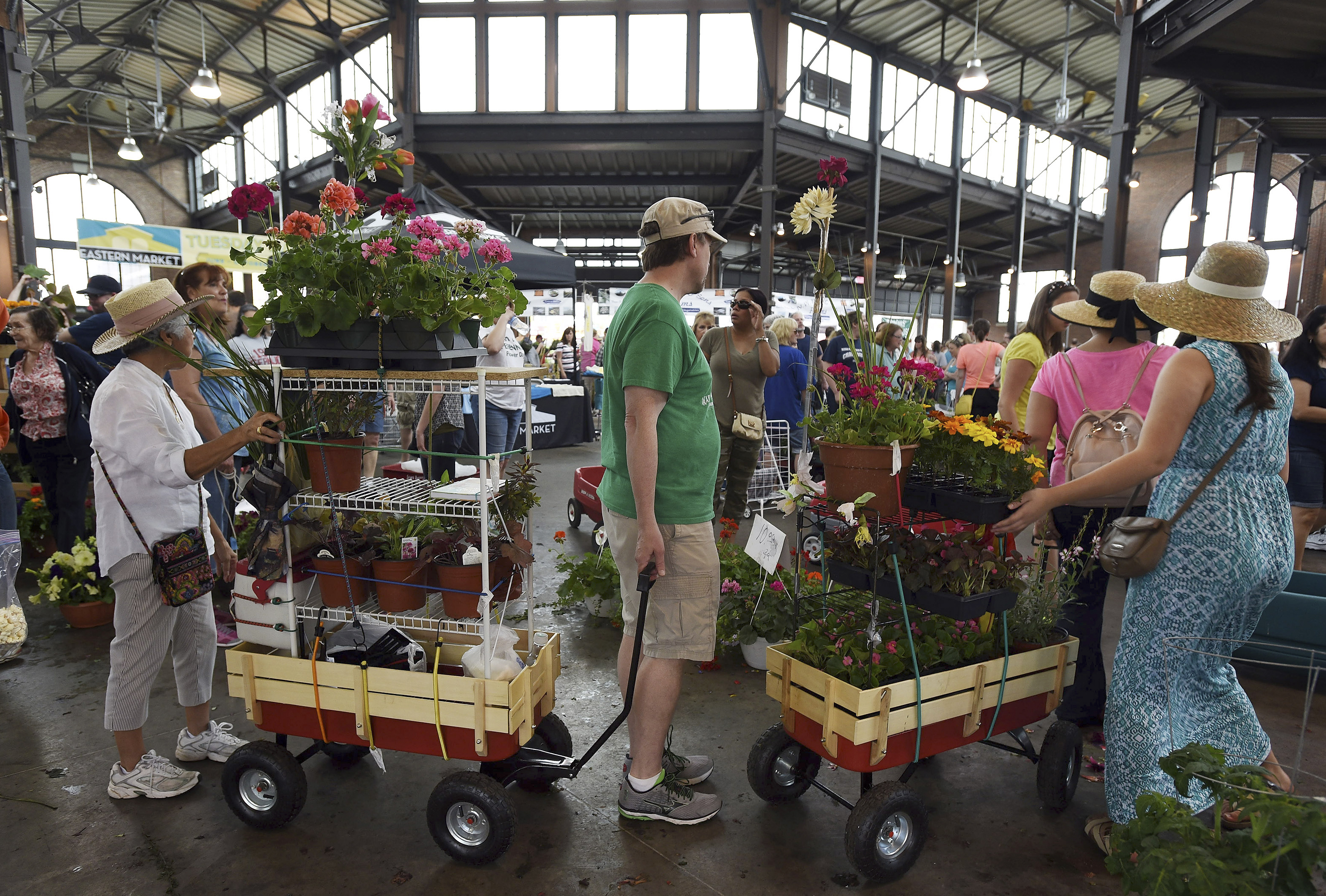 Consumer confidence edges up in May on improving job market