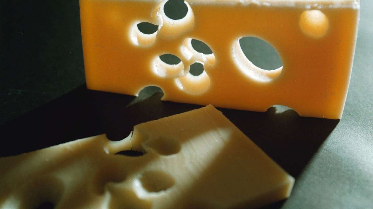 Mystery of disappearing holes in Swiss cheese solved