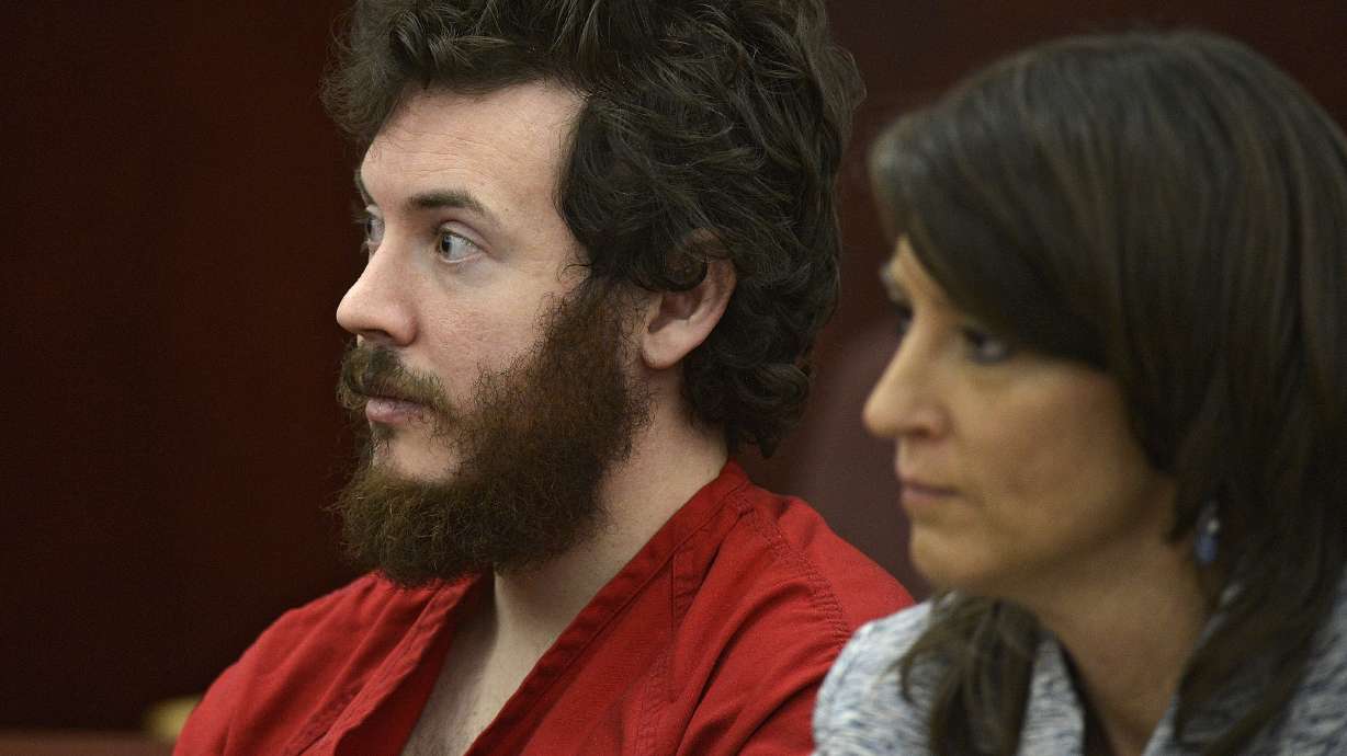 The Latest: James Holmes says God would care about shootings