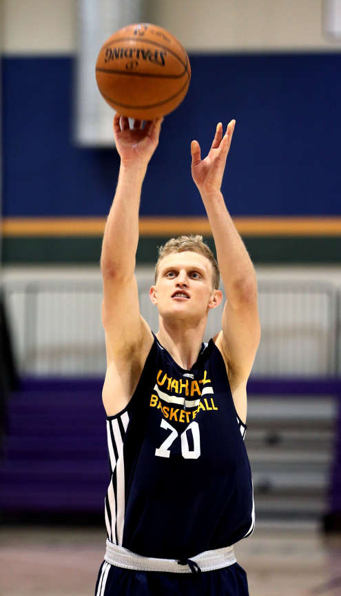Former BYU star Tyler Haws takes a few shots for the media after a work out for the Utah Jazz Monday, June 1, 2015, inside the Zions Bank Basketball Center in Salt Lake City. (Scott G Winterton/Deseret News)