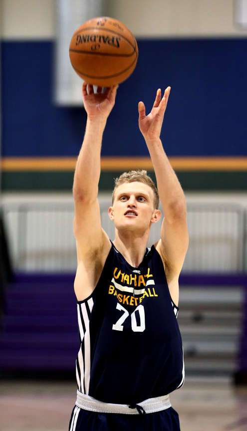 Former BYU star Tyler Haws takes a few shots for the media after a work out for the Utah Jazz Monday, June 1, 2015, inside the Zions Bank Basketball Center in Salt Lake City. (Scott G Winterton/Deseret News)